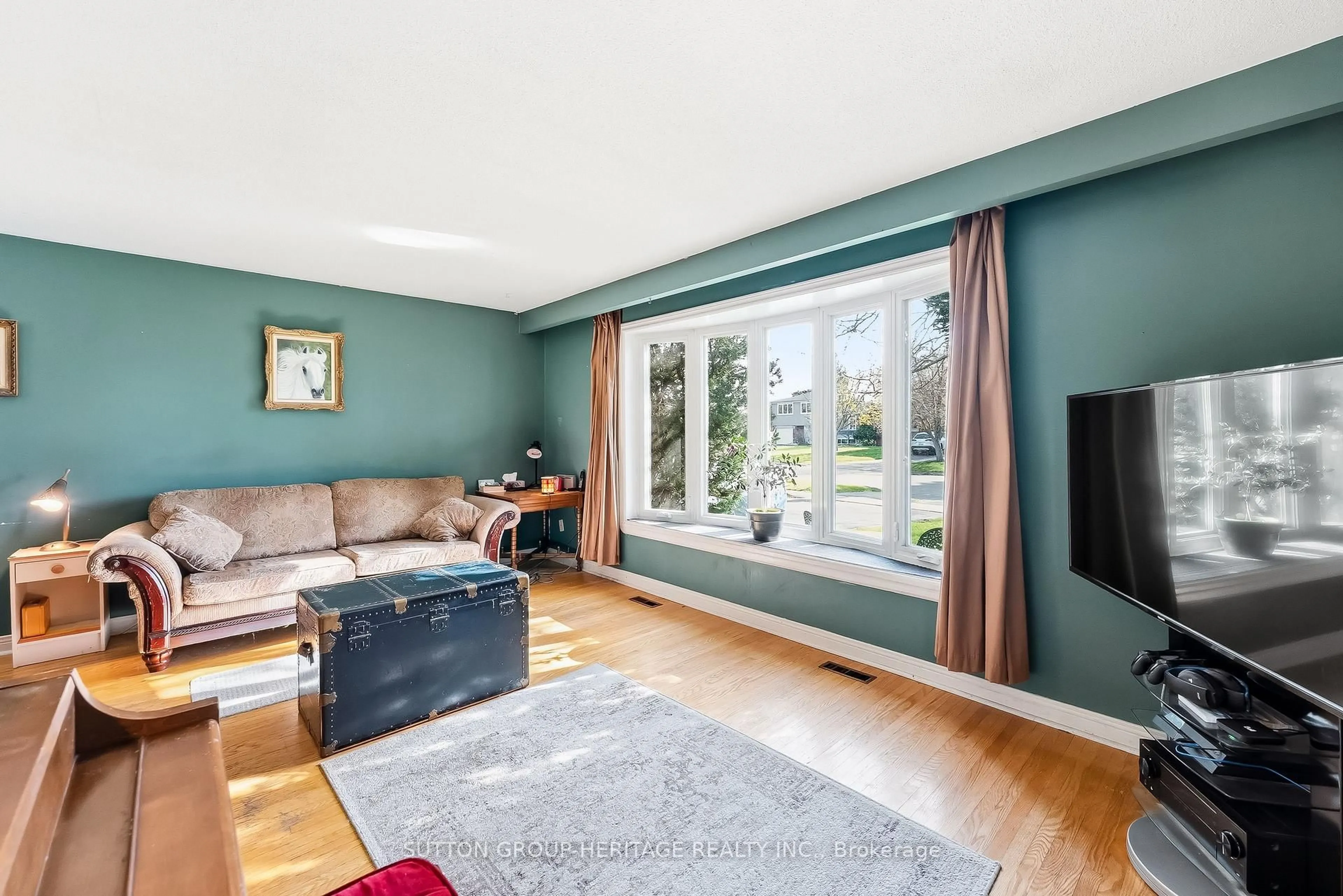 Living room with furniture, wood/laminate floor for 35 Albery Cres, Ajax Ontario L1S 2Y2