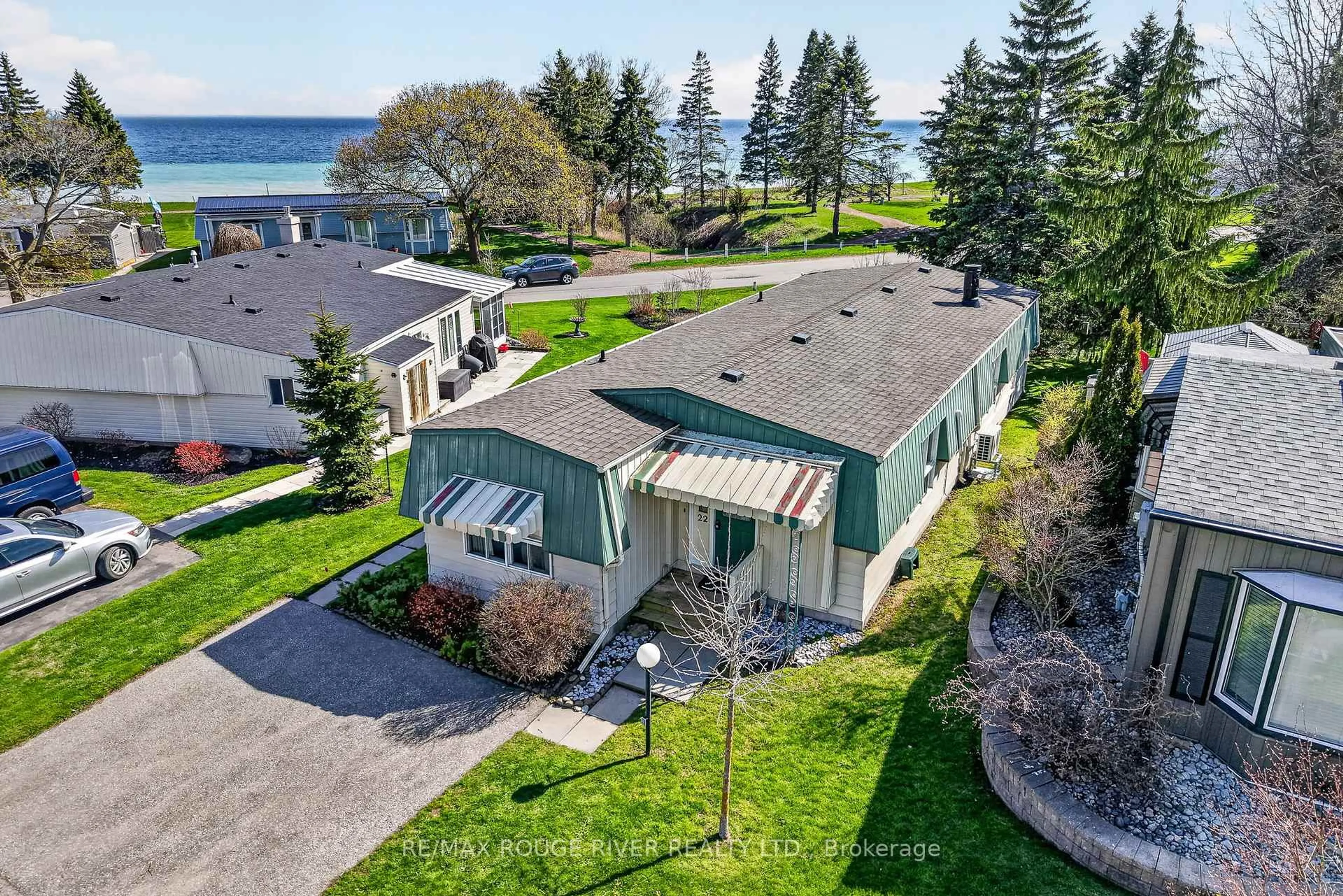 A pic from outside/outdoor area/front of a property/back of a property/a pic from drone, water/lake/river/ocean view for 22 Eastbank Rd, Clarington Ontario L1B 1A4