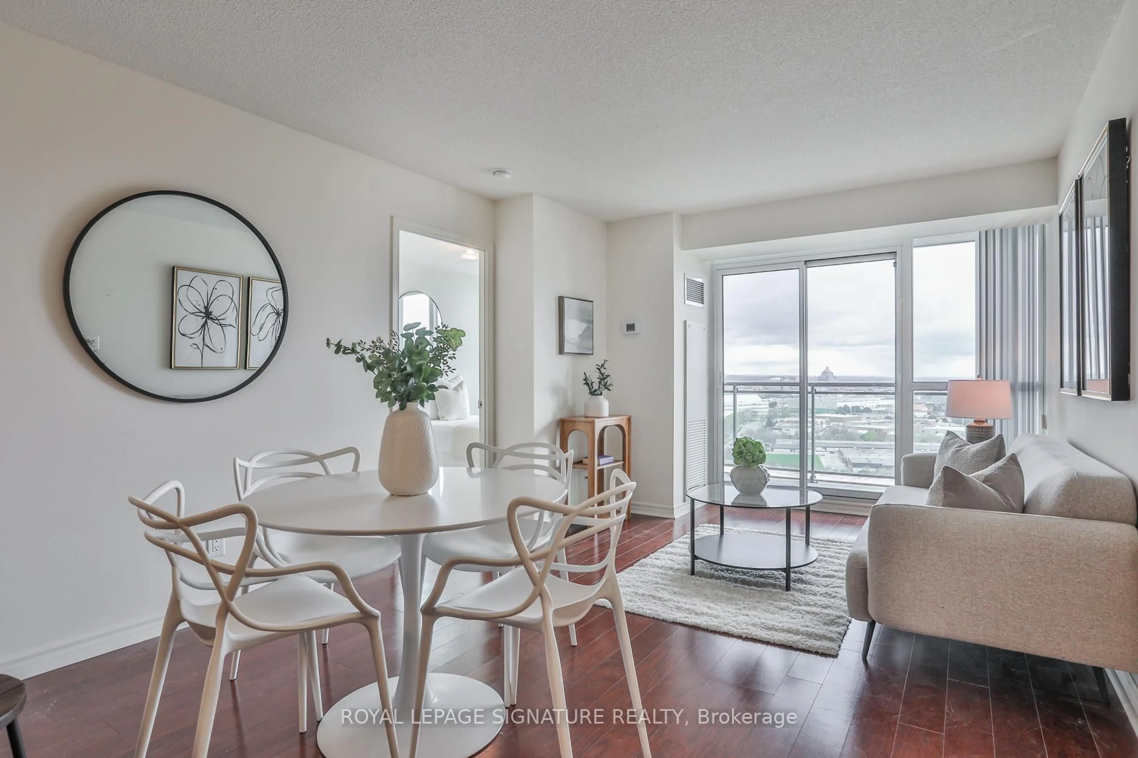 Dining room, wood/laminate floor for 88 Grangeway Ave #2207, Toronto Ontario M1H 0A2