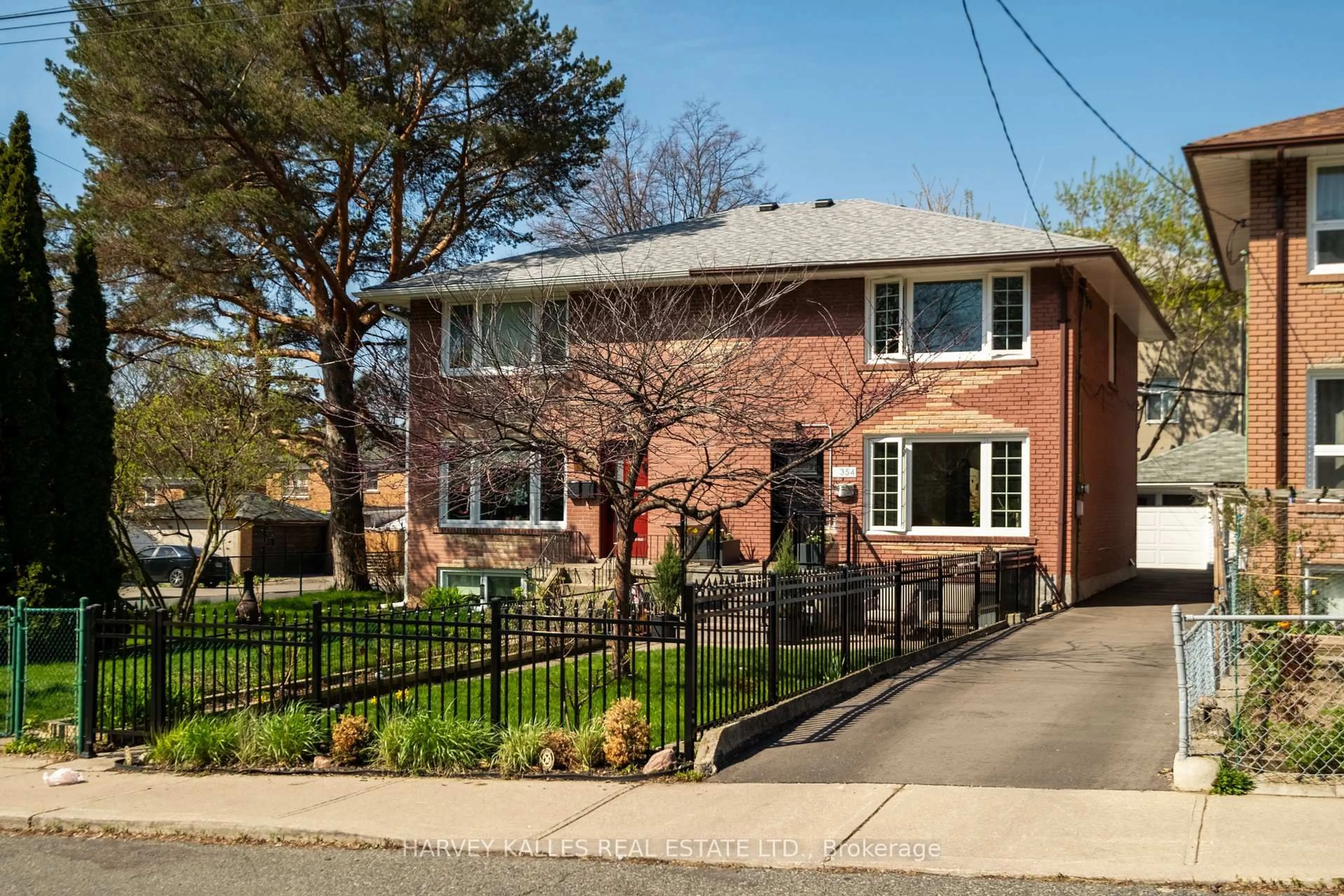 Home with brick exterior material, street for 354 Highfield Rd, Toronto Ontario M4L 2V6