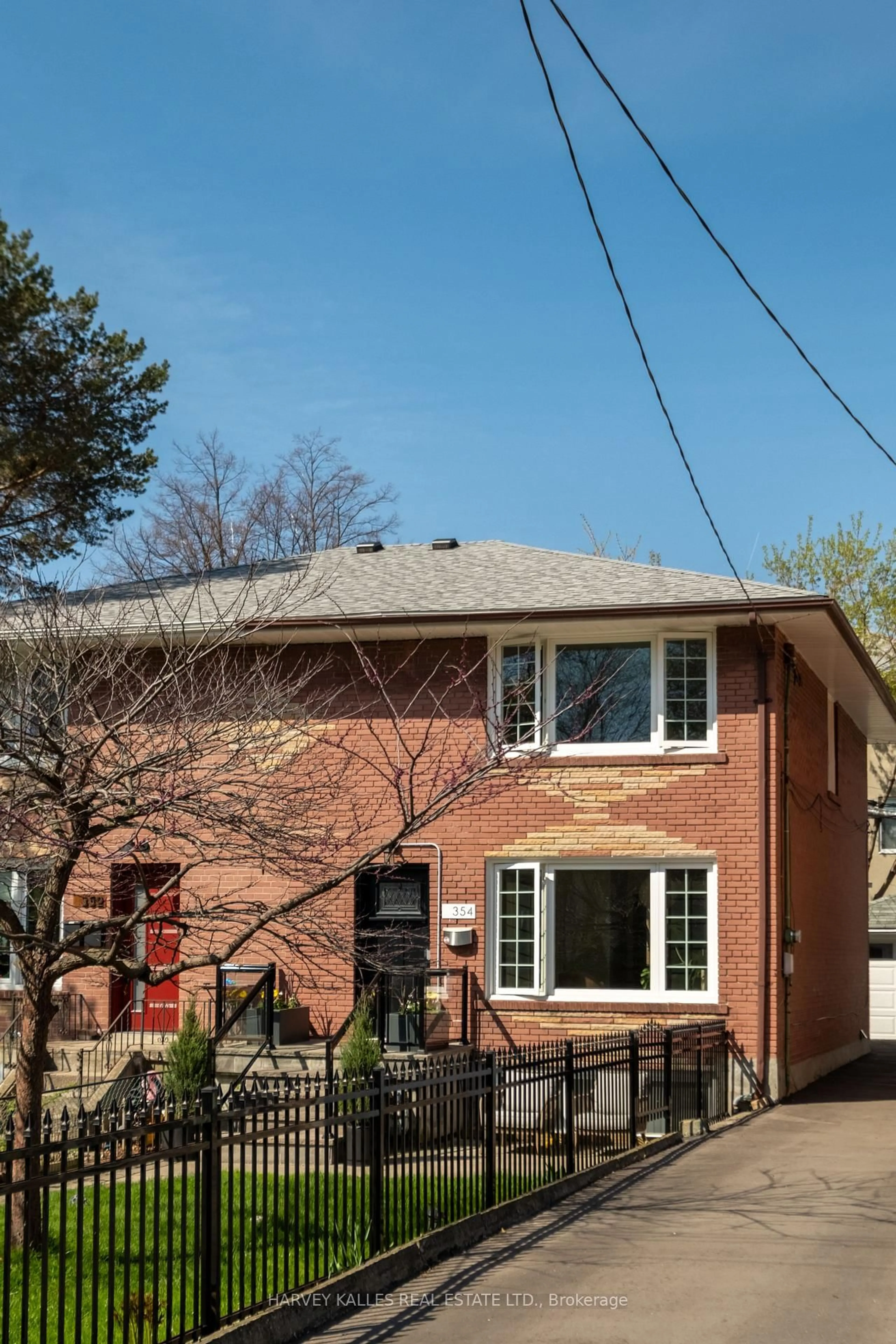 Home with brick exterior material, street for 354 Highfield Rd, Toronto Ontario M4L 2V6