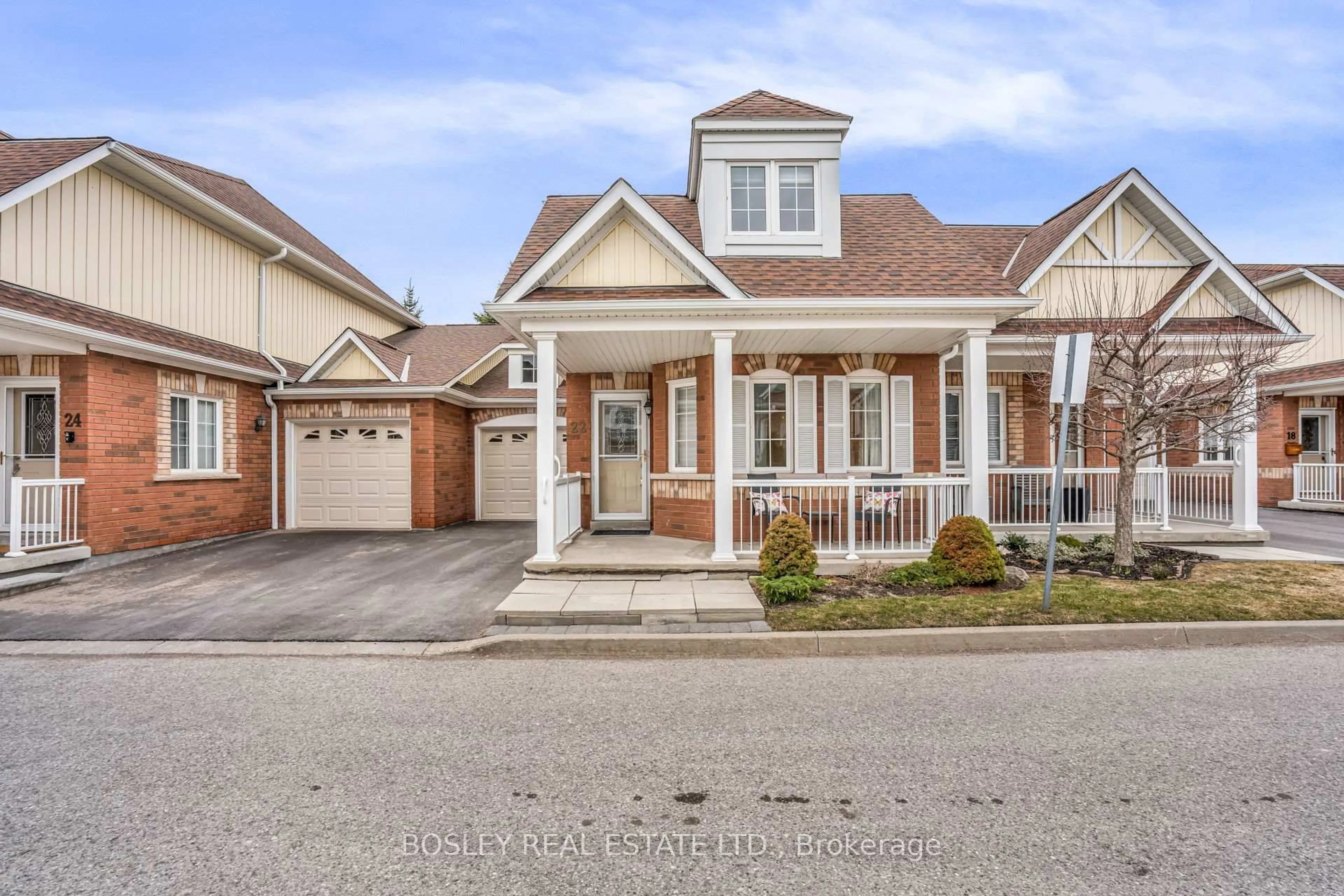 Home with brick exterior material, street for 22 Gidley Lane #24, Ajax Ontario L1T 4Z7