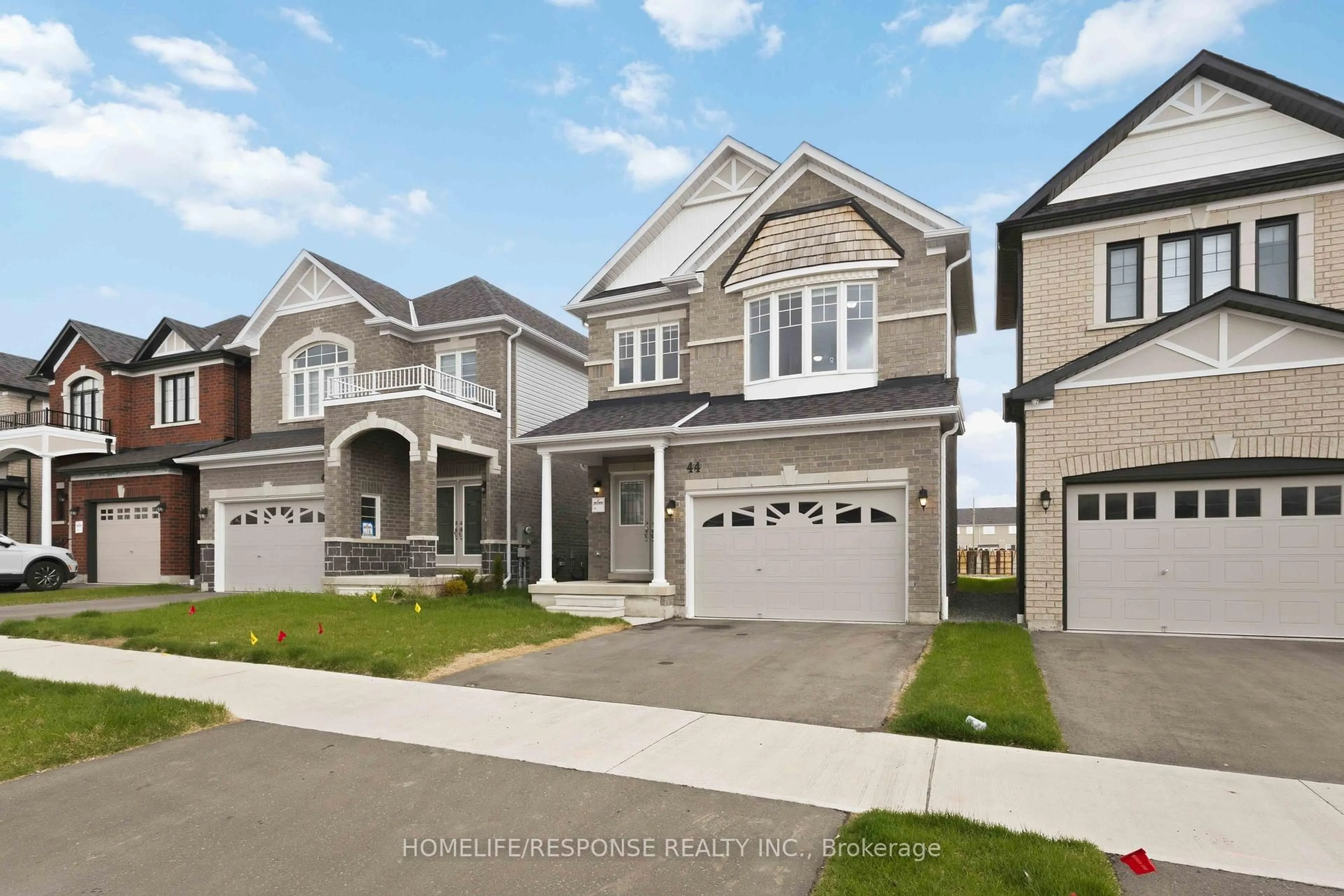 Home with vinyl exterior material, street for 44 Denny St, Ajax Ontario L1Z 0C6