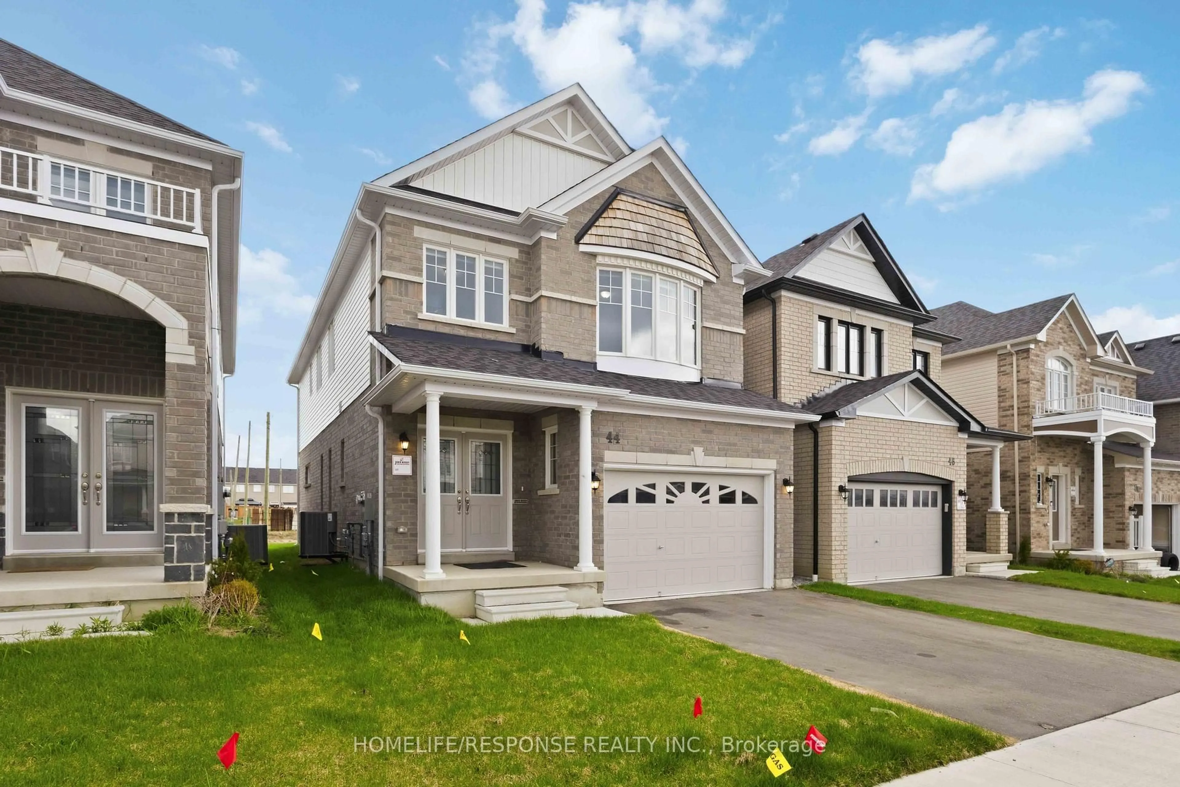 Home with vinyl exterior material, street for 44 Denny St, Ajax Ontario L1Z 0C6