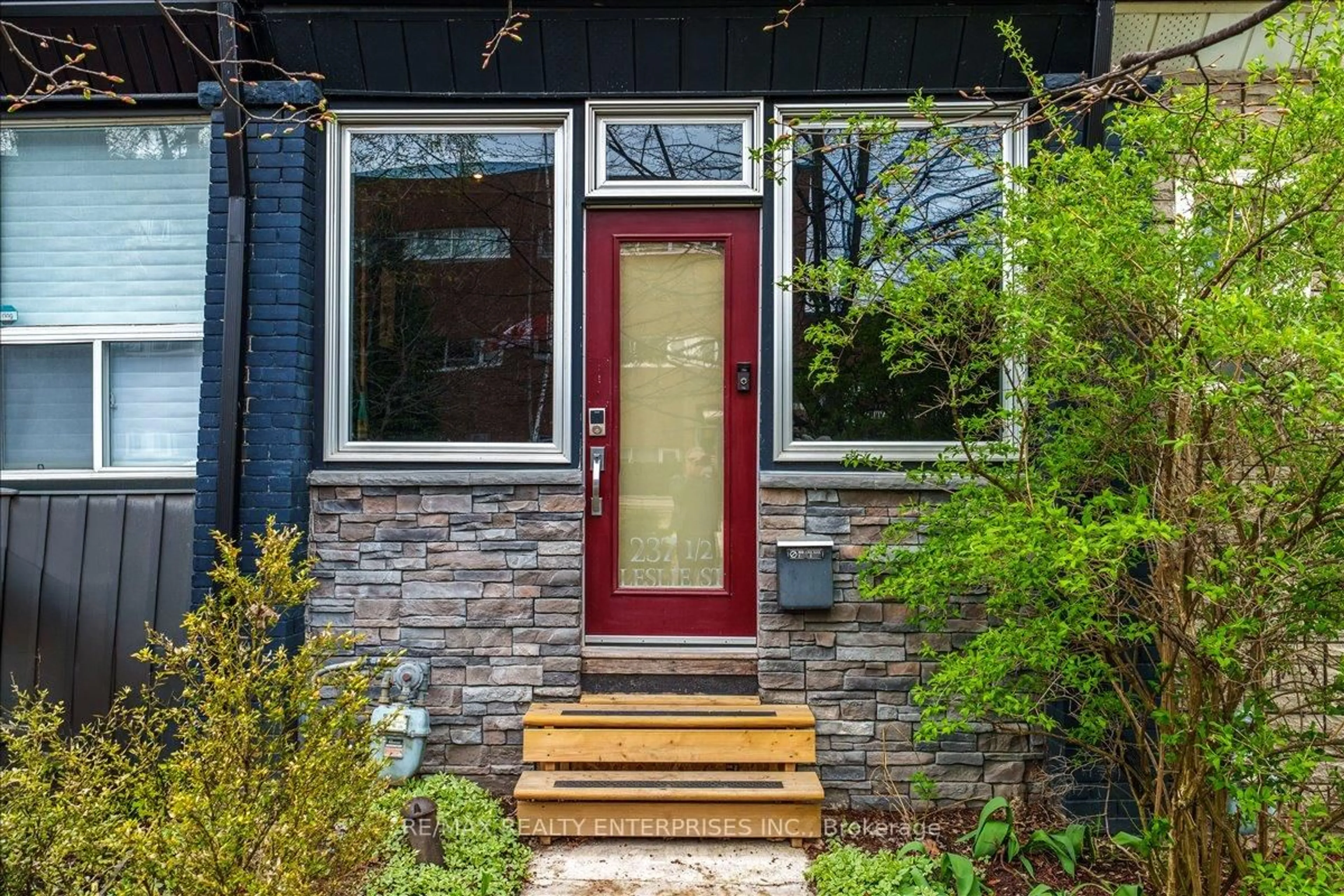 Home with brick exterior material, street for 237A Leslie St, Toronto Ontario M4M 3C8