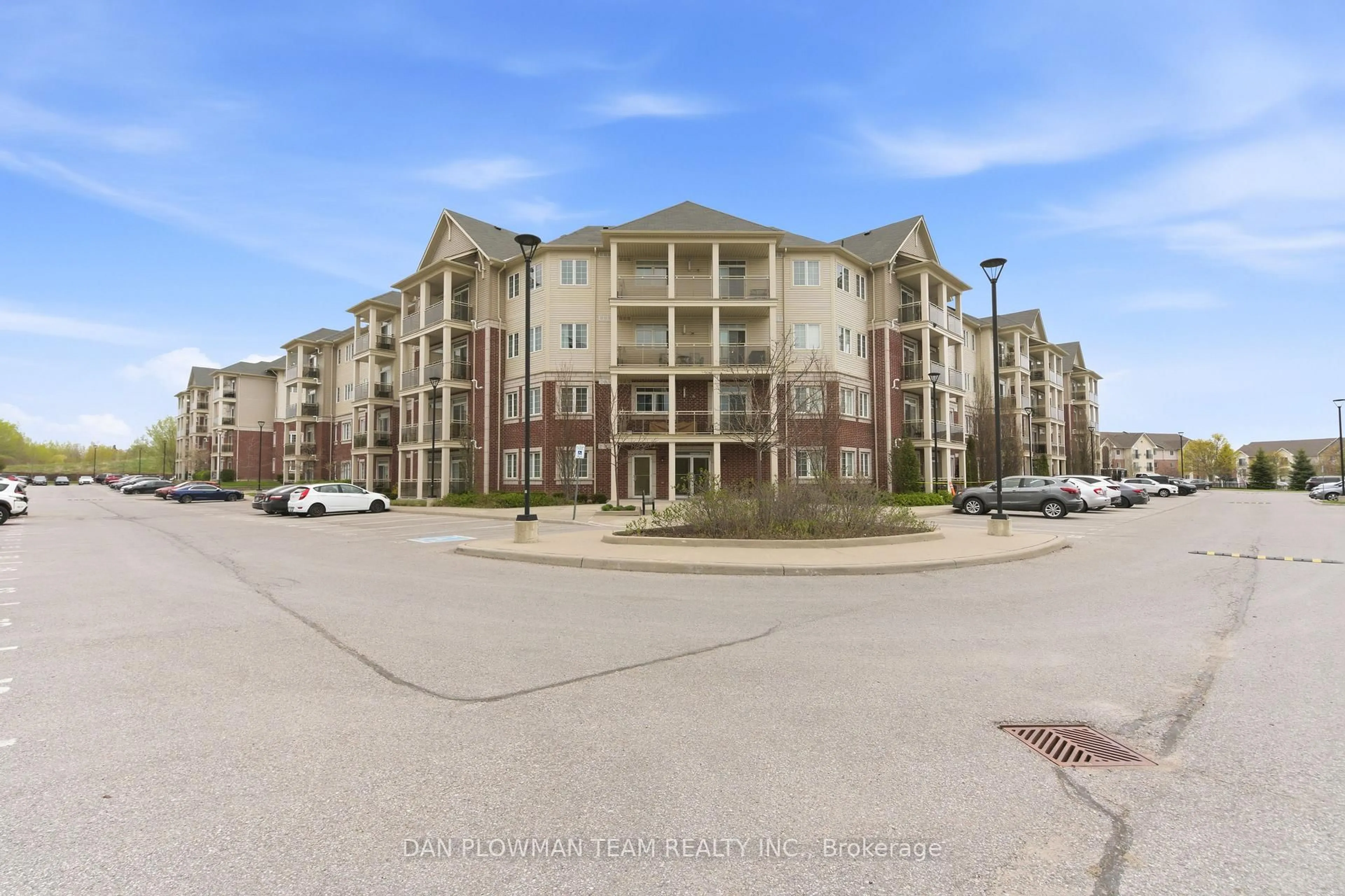 A pic from outside/outdoor area/front of a property/back of a property/a pic from drone, unknown for 84 Aspen Springs Dr #419, Clarington Ontario L1C 0V3