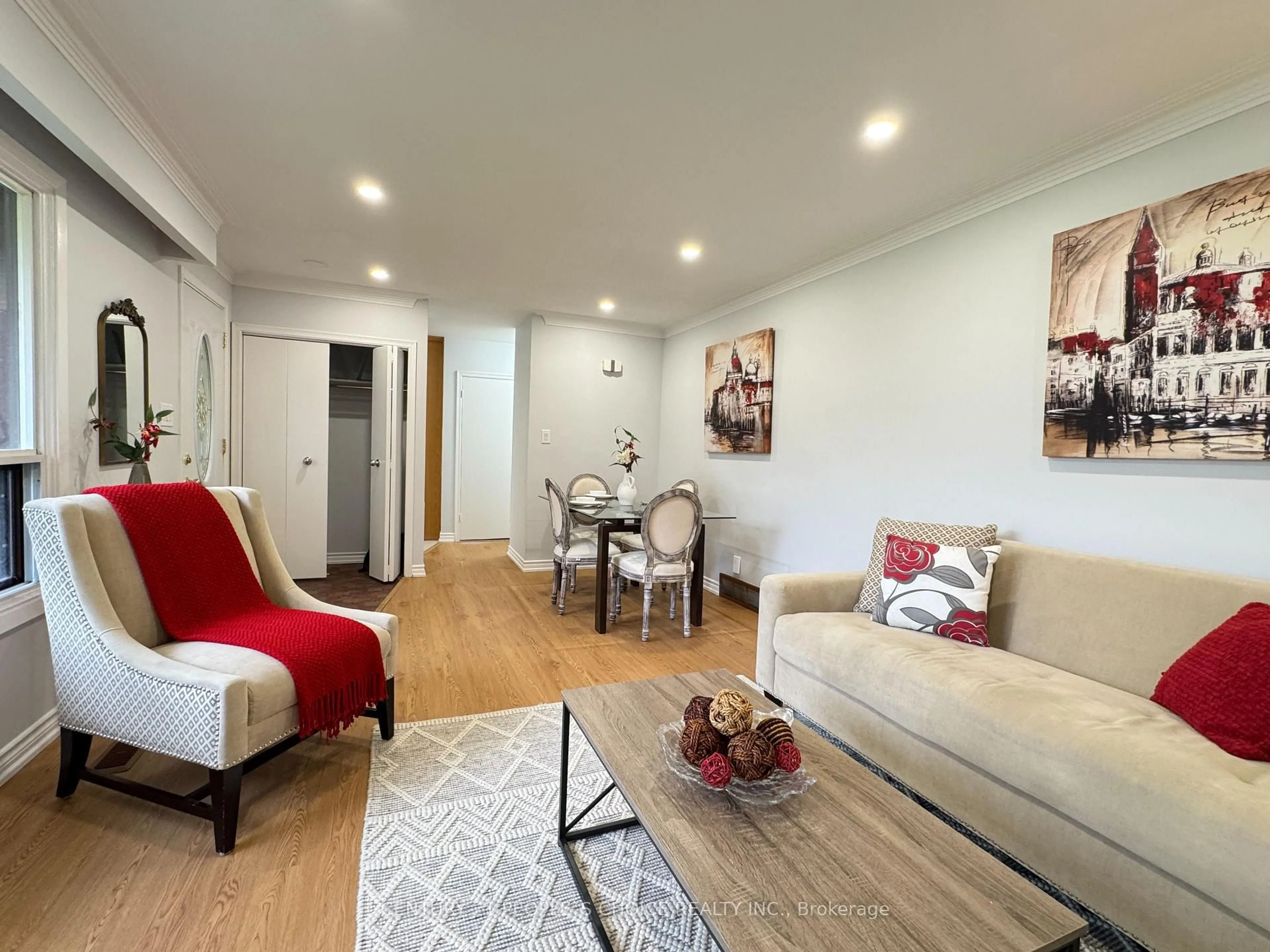 Living room with furniture, wood/laminate floor for 586 Central Pk Blvd, Oshawa Ontario L1G 6A4