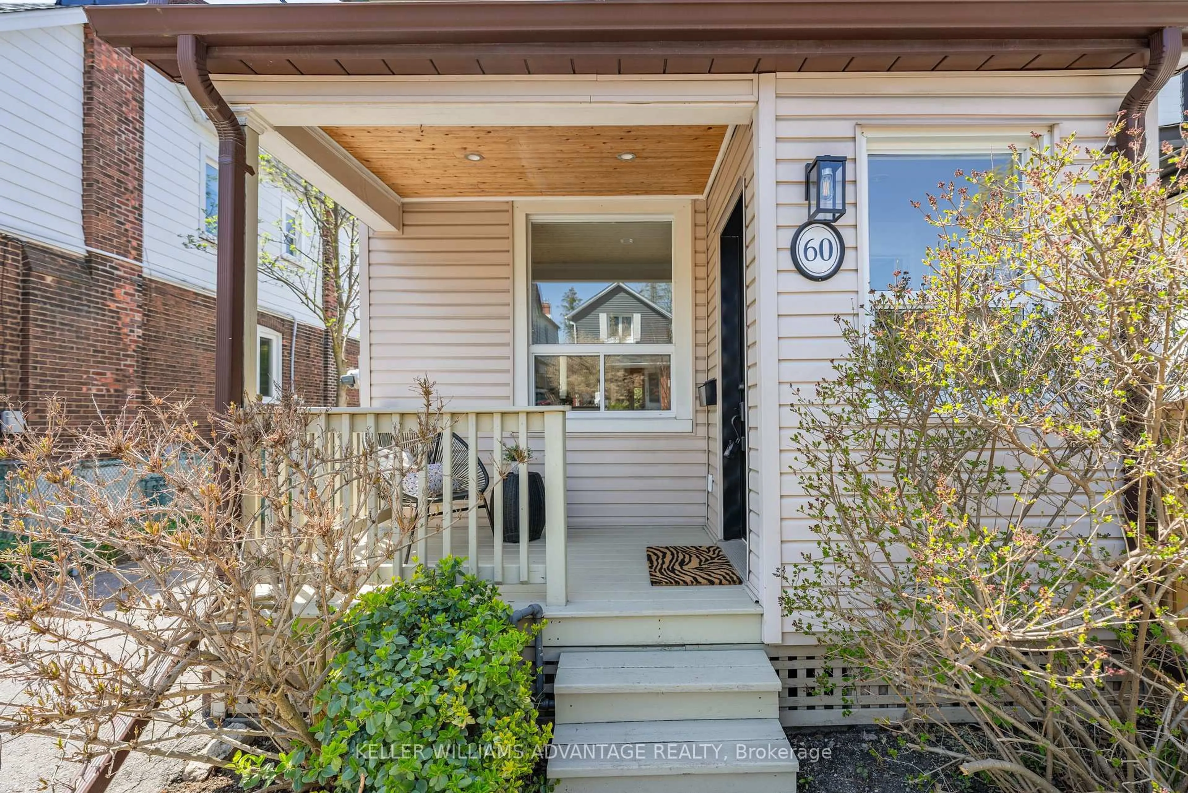Home with vinyl exterior material, street for 60 Wayland Ave, Toronto Ontario M4E 3C9
