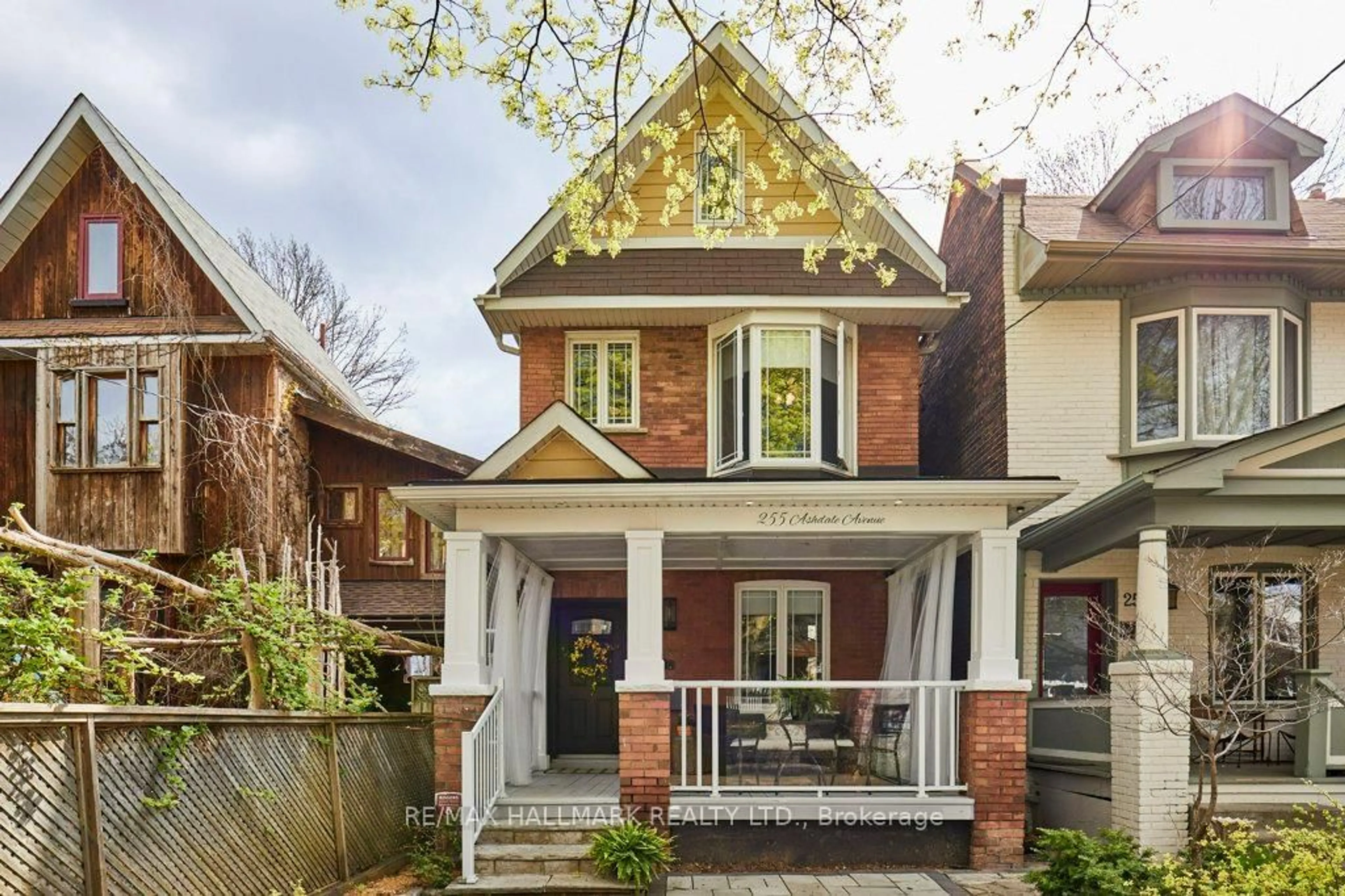 Home with brick exterior material, street for 255 Ashdale Ave, Toronto Ontario M4L 2Y8