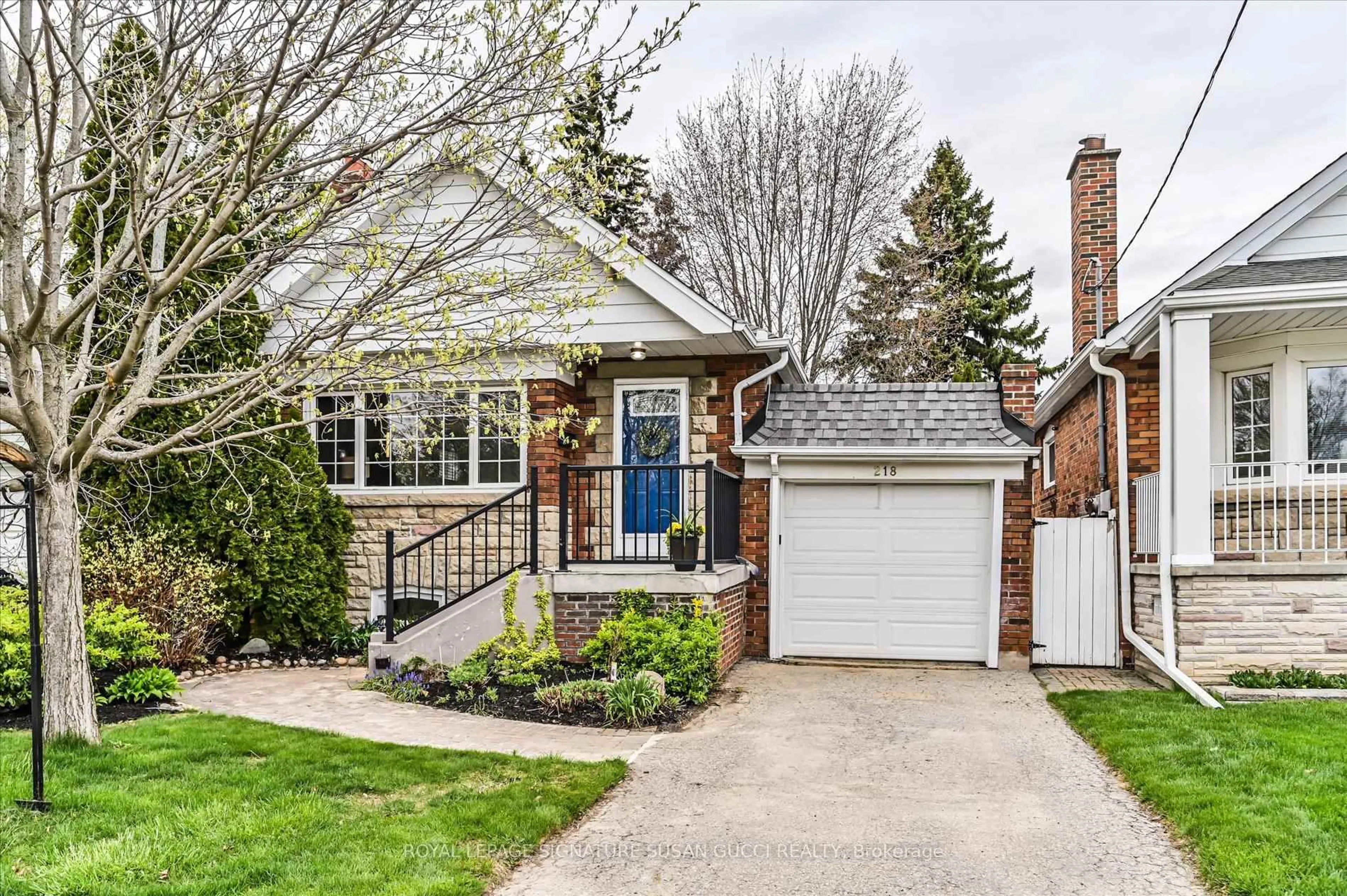 Home with brick exterior material, street for 218 Glenwood Cres, Toronto Ontario M4B 1K4