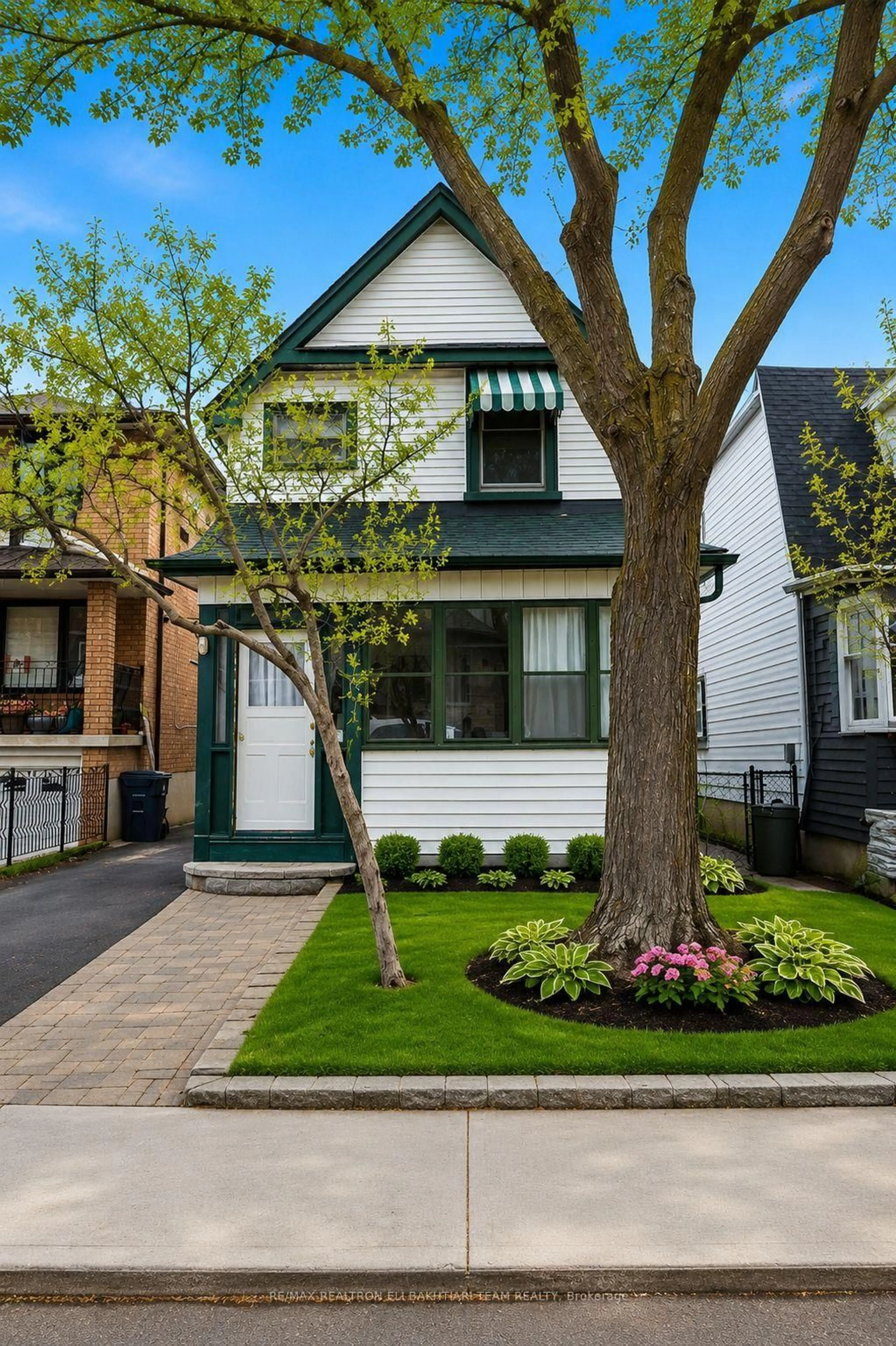 Home with brick exterior material, street for 43 King Edward Ave, Toronto Ontario M4C 5J5