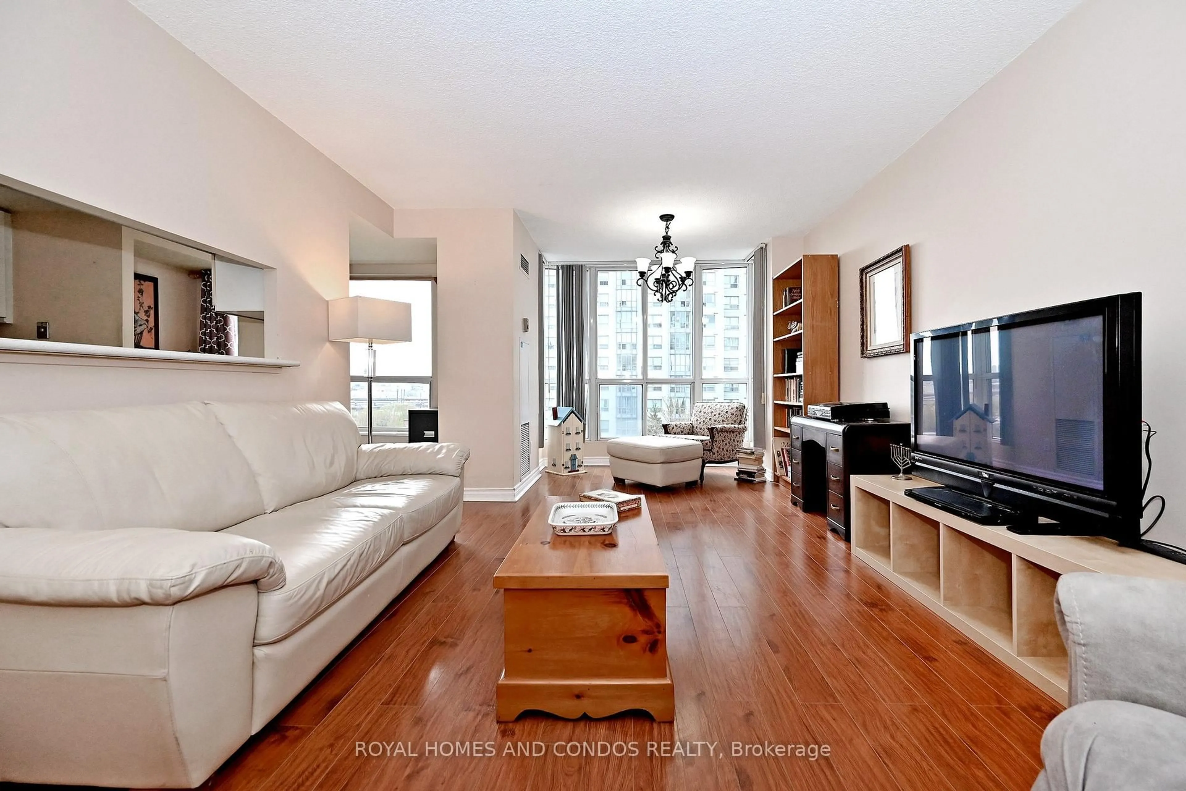 Living room with furniture, wood/laminate floor for 2550 Lawrence Ave #618, Toronto Ontario M1P 2R7