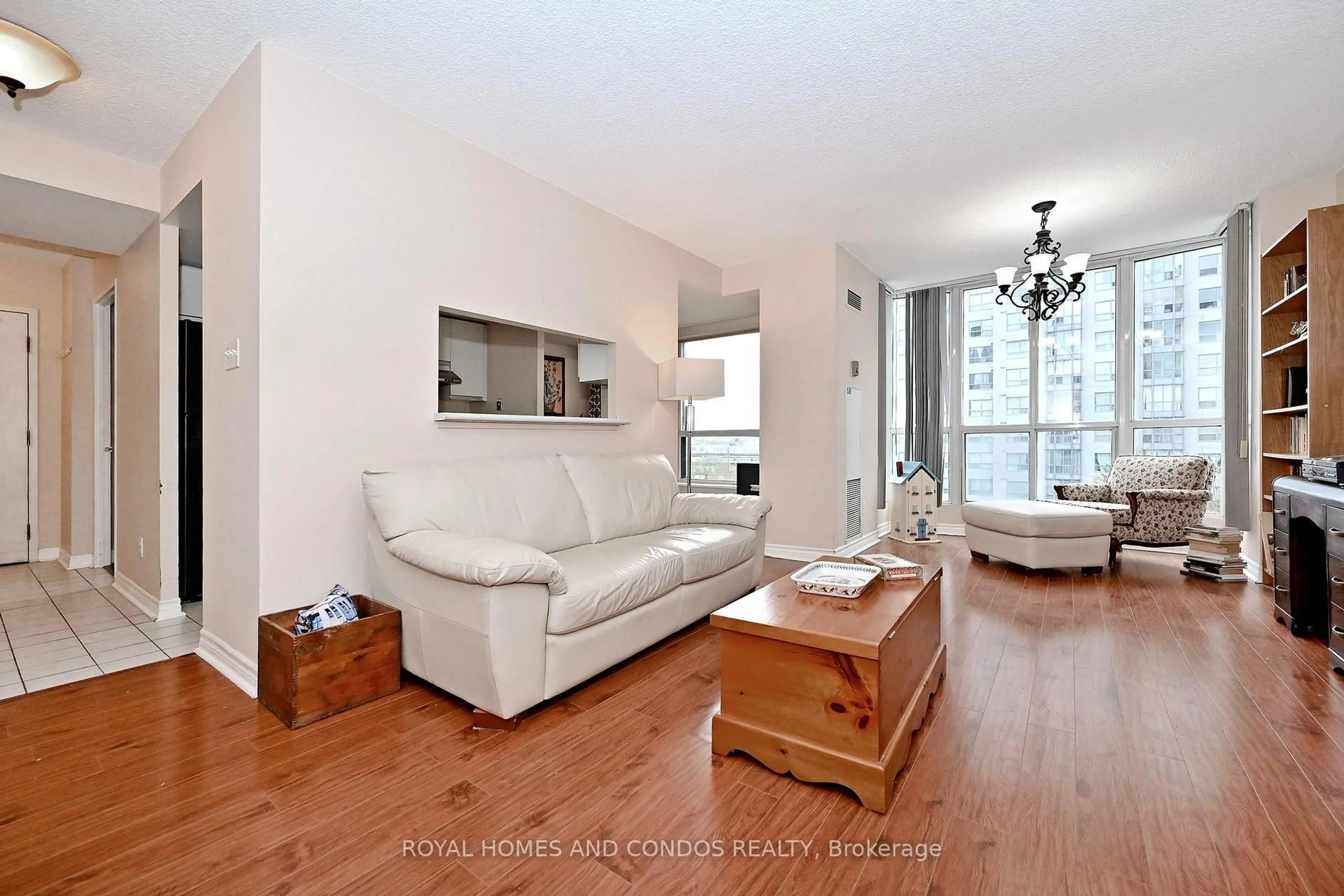 Living room with furniture, wood/laminate floor for 2550 Lawrence Ave #618, Toronto Ontario M1P 2R7