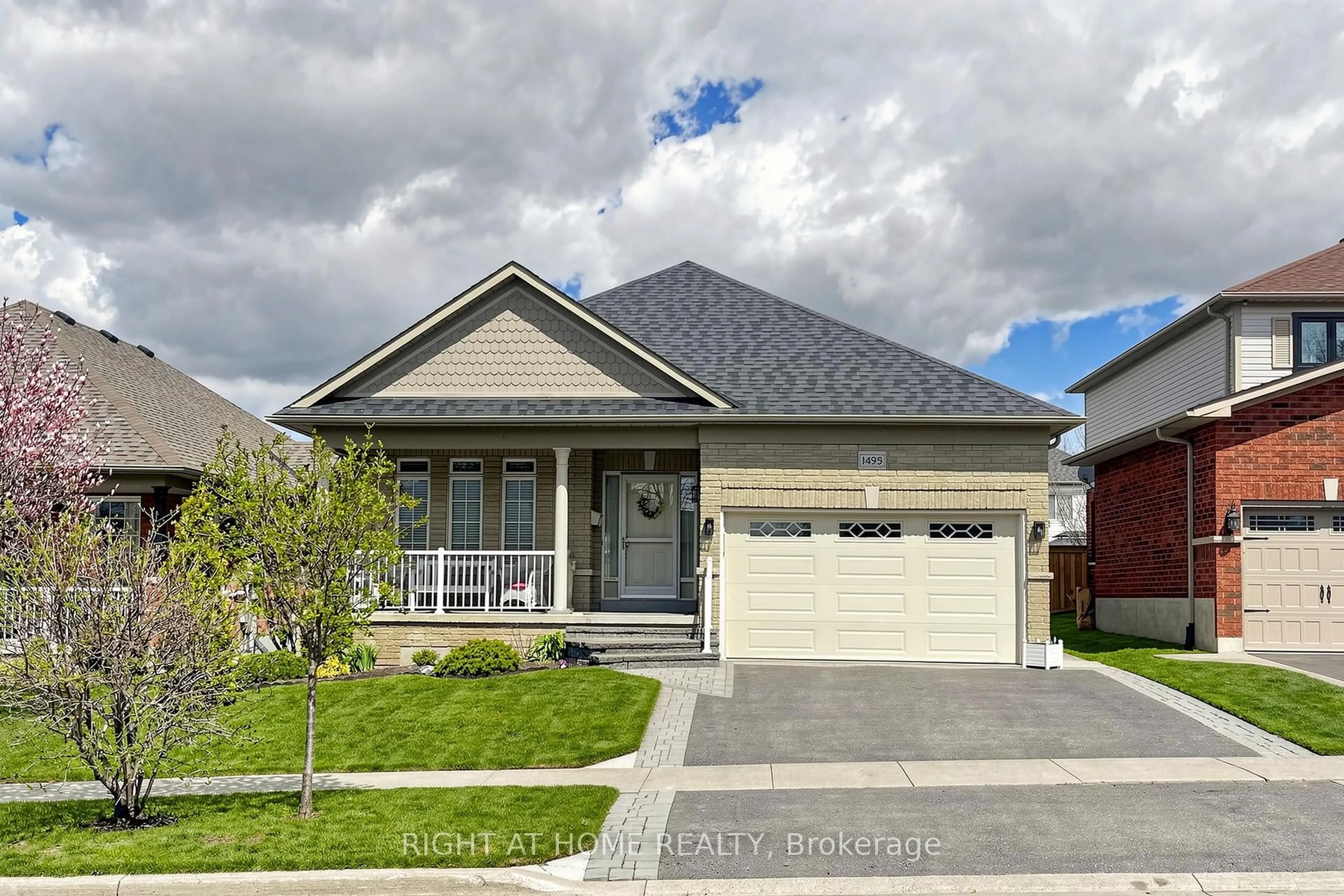 Home with brick exterior material, street for 1495 Greenvalley Tr, Oshawa Ontario L1K 2N5