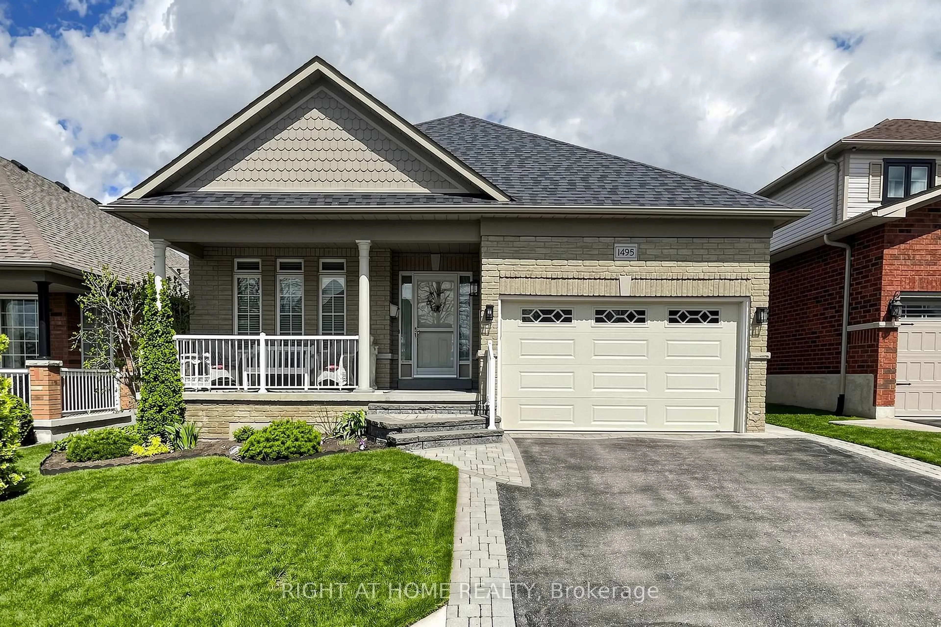 Home with brick exterior material, street for 1495 Greenvalley Tr, Oshawa Ontario L1K 2N5