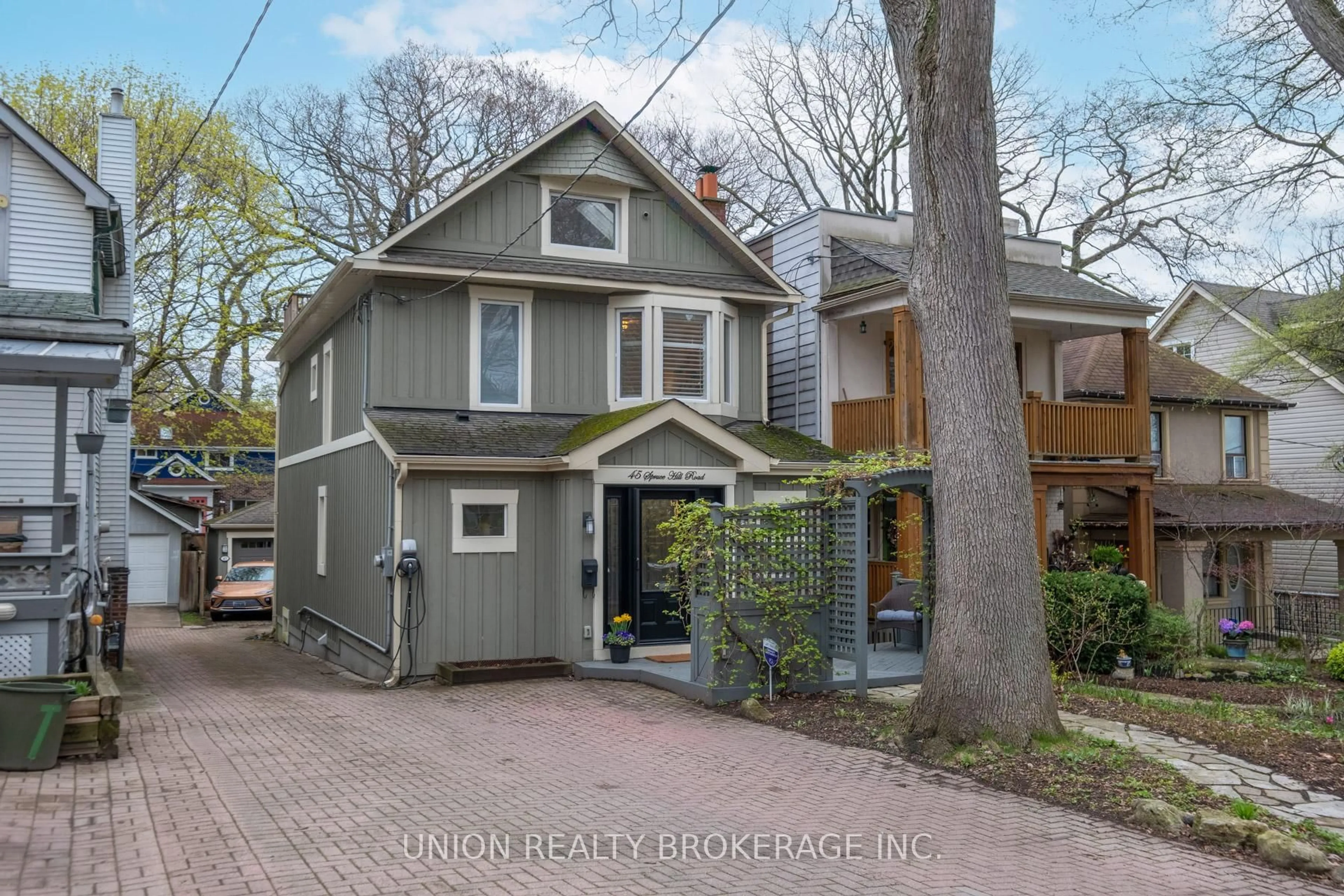 Home with brick exterior material, street for 45 Spruce Hill Rd, Toronto Ontario M4E 3G2
