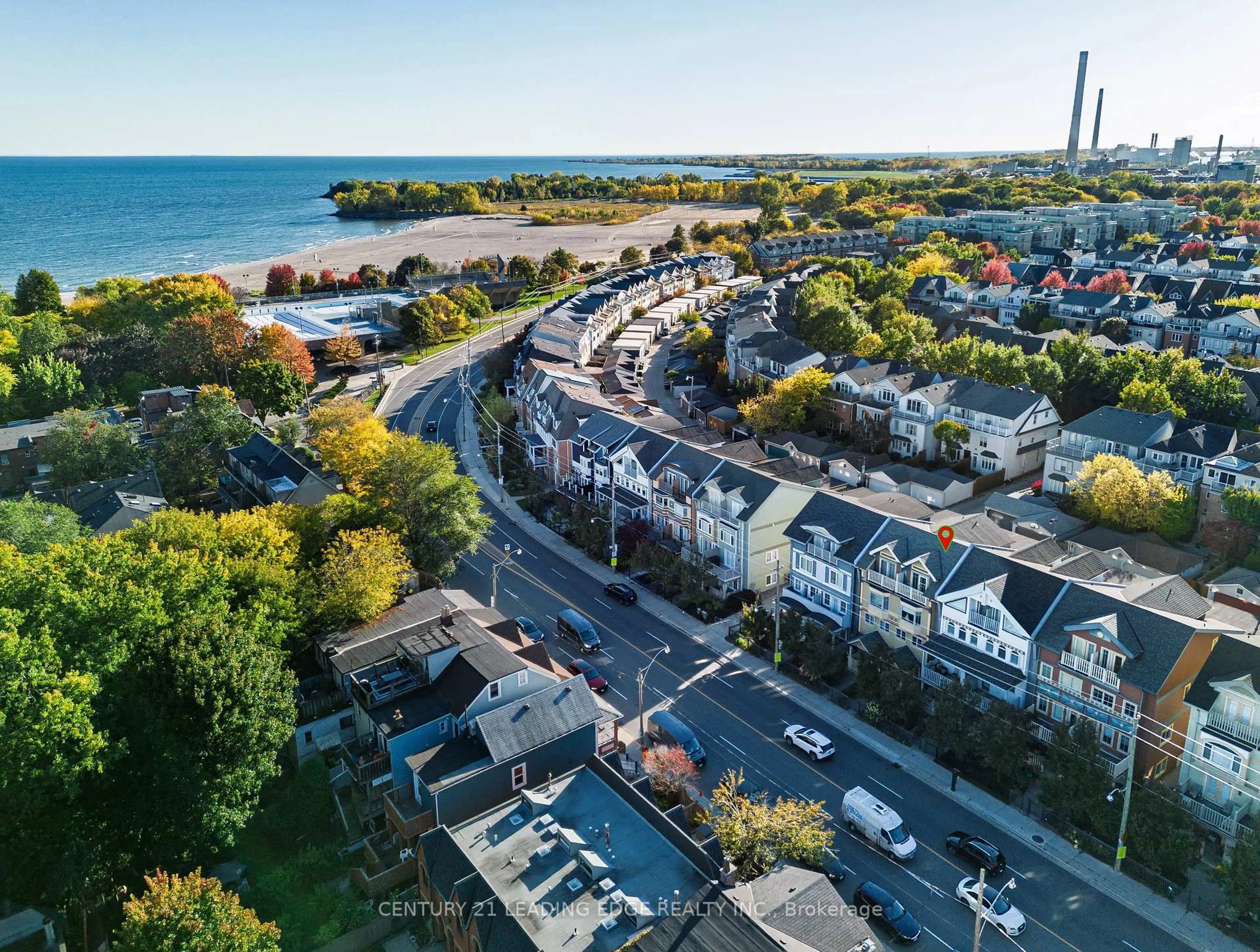 A pic from outside/outdoor area/front of a property/back of a property/a pic from drone, water/lake/river/ocean view for 82 Woodbine Ave, Toronto Ontario M4L 2A2