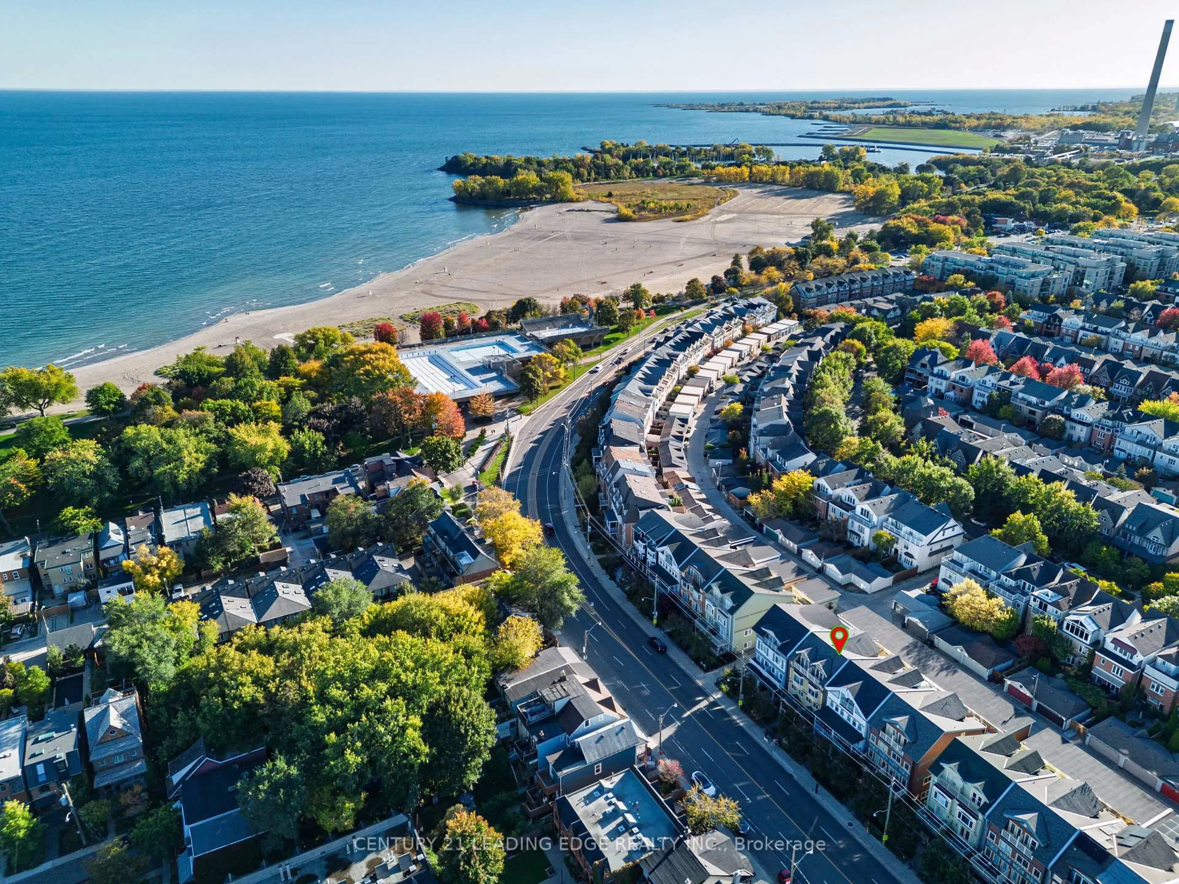 A pic from outside/outdoor area/front of a property/back of a property/a pic from drone, water/lake/river/ocean view for 82 Woodbine Ave, Toronto Ontario M4L 2A2