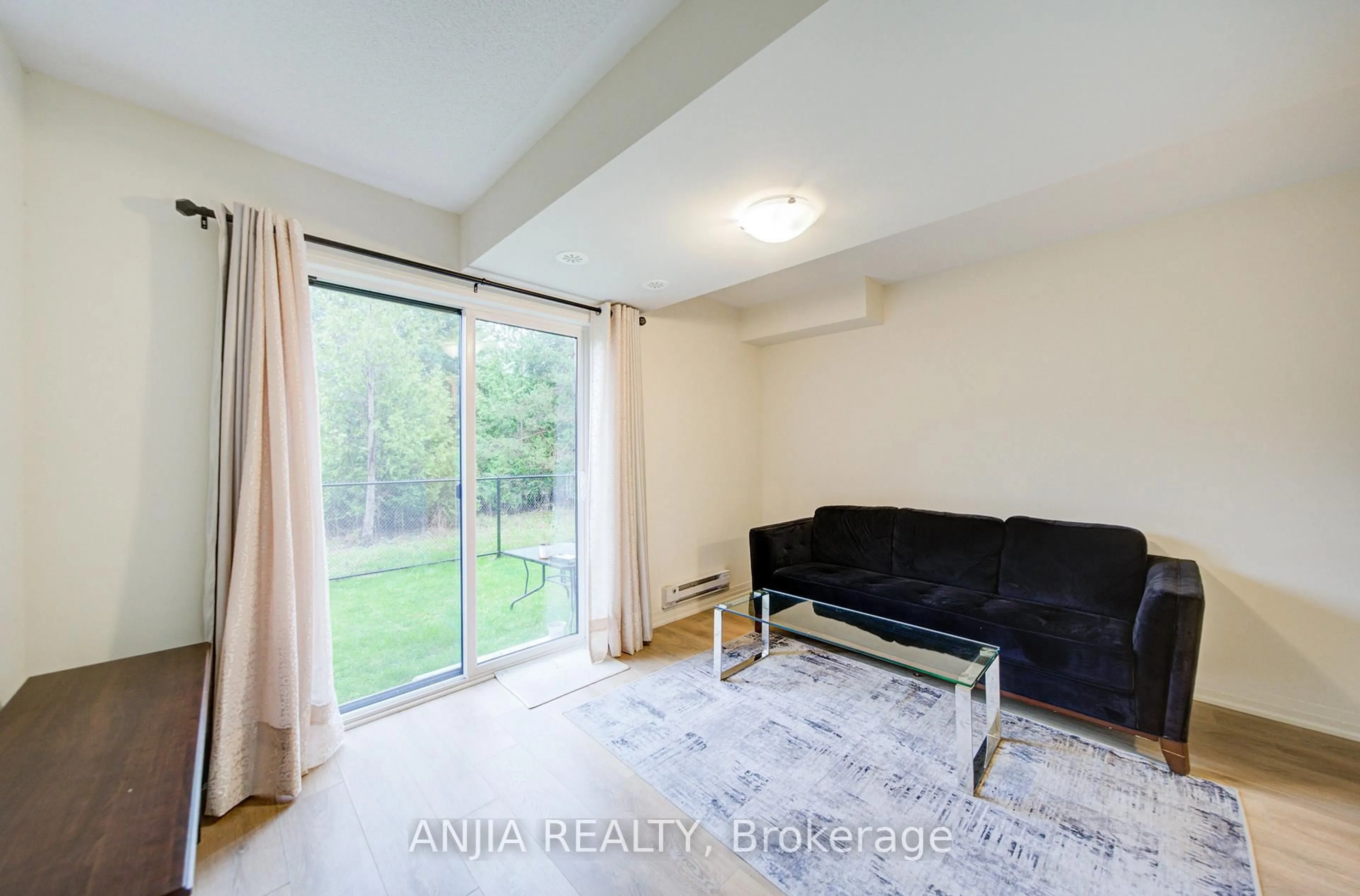 Living room with furniture, unknown for 53 Emmas Way, Whitby Ontario L1R 0S7