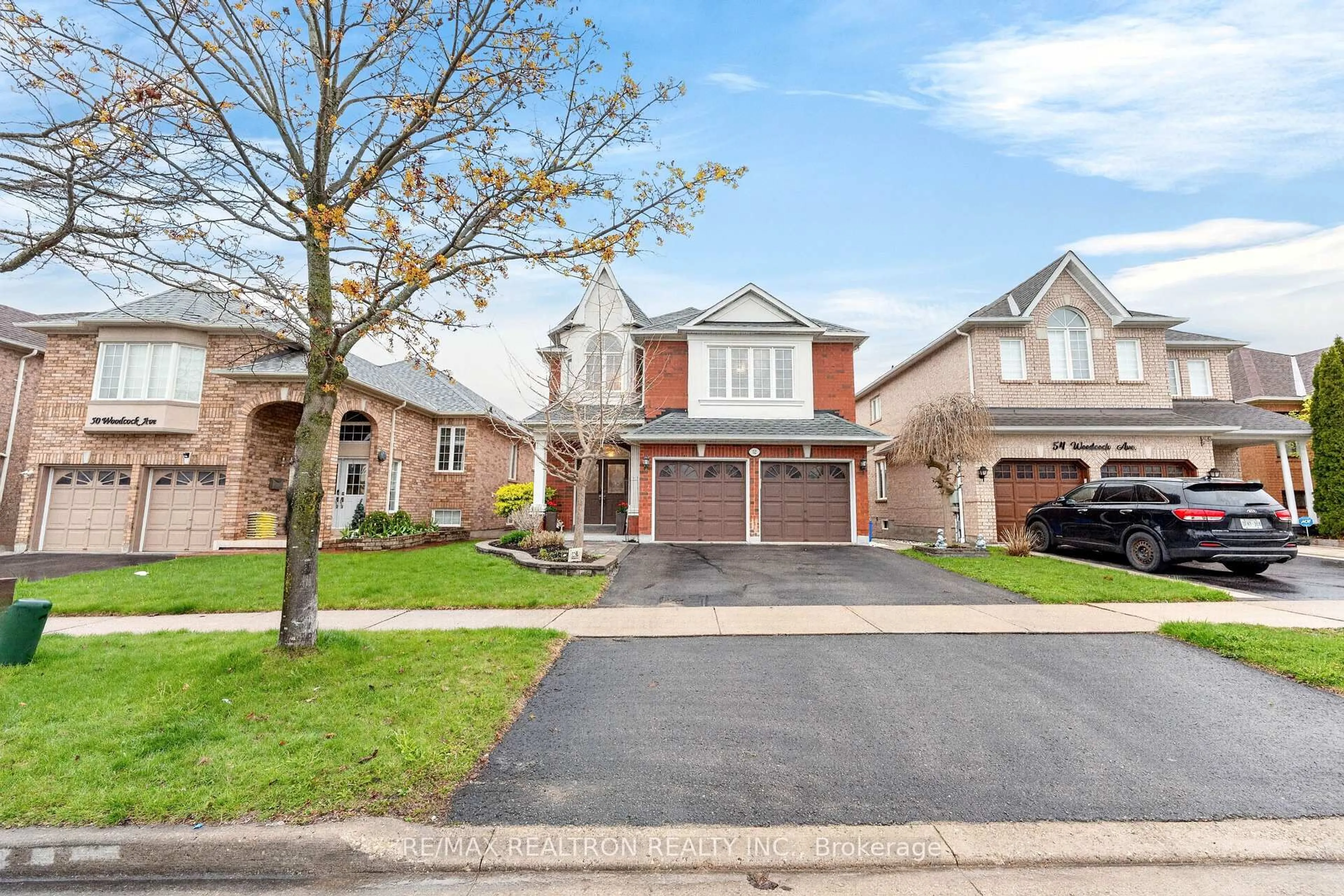 Home with brick exterior material, street for 52 Woodcock Ave, Ajax Ontario L1T 4J7