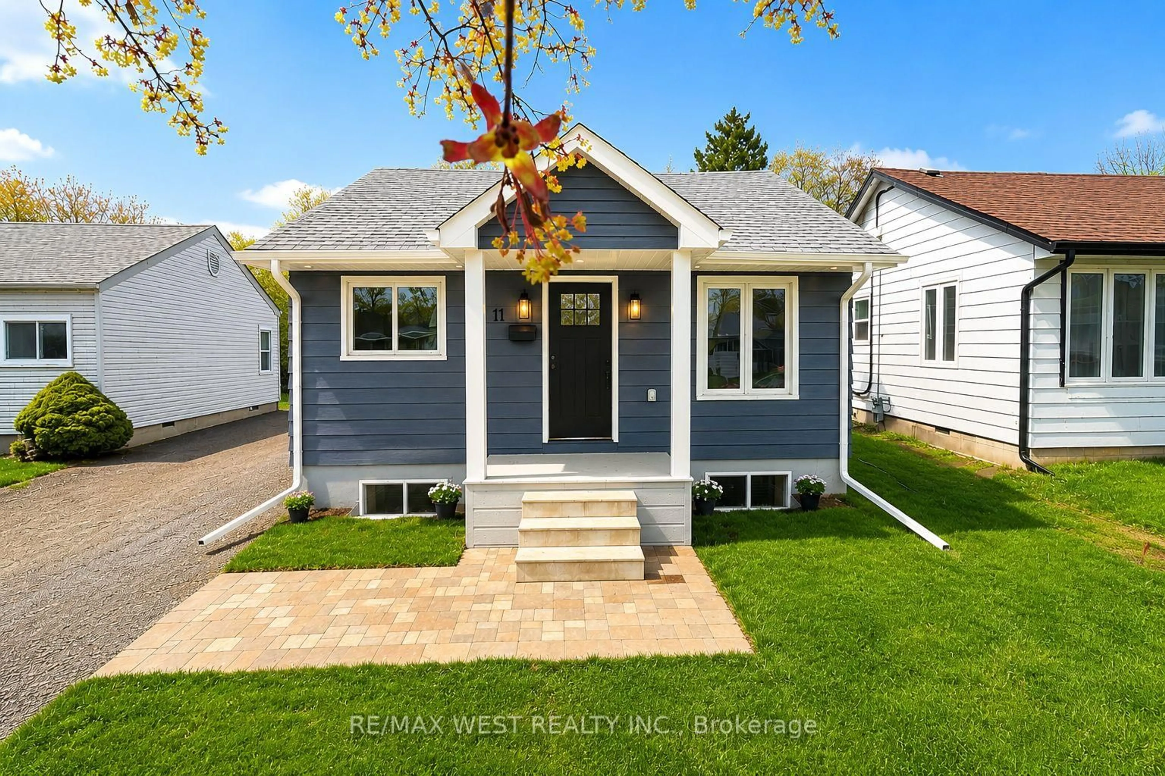 Home with vinyl exterior material, street for 11 Pine St, Ajax Ontario L1S 1X8
