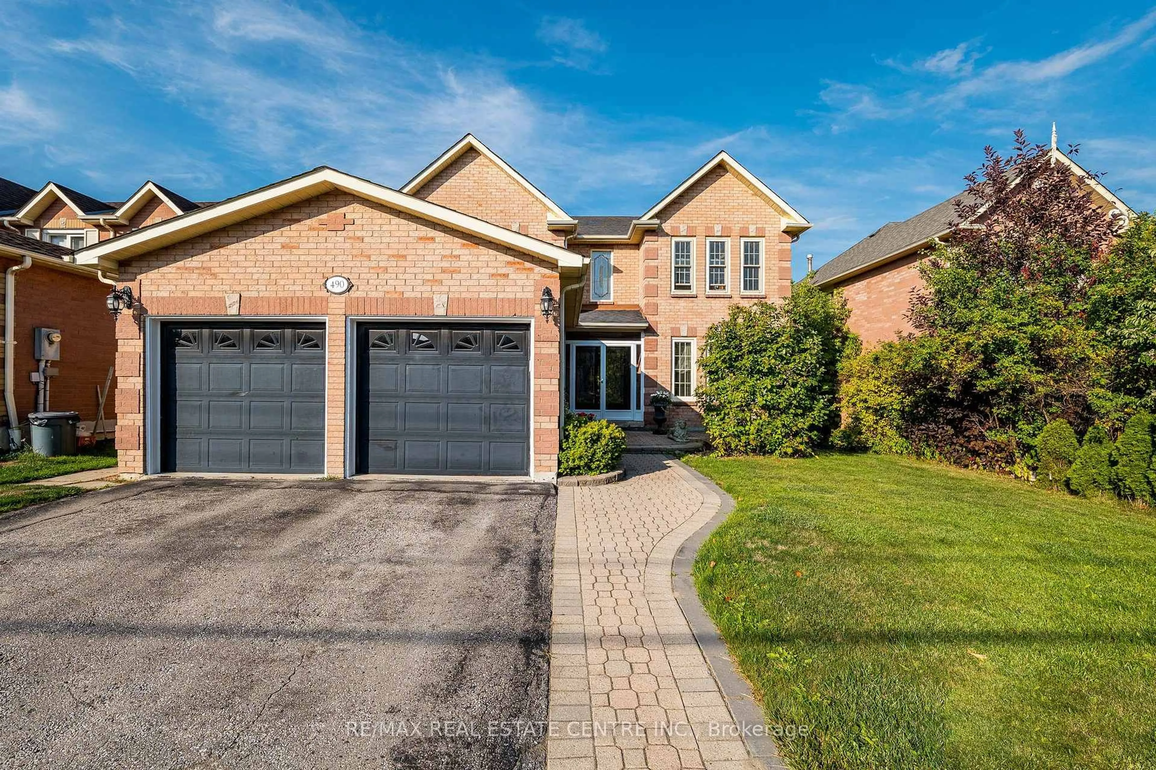 Home with brick exterior material, street for 490 Old Harwood Ave, Ajax Ontario L1T 3L1