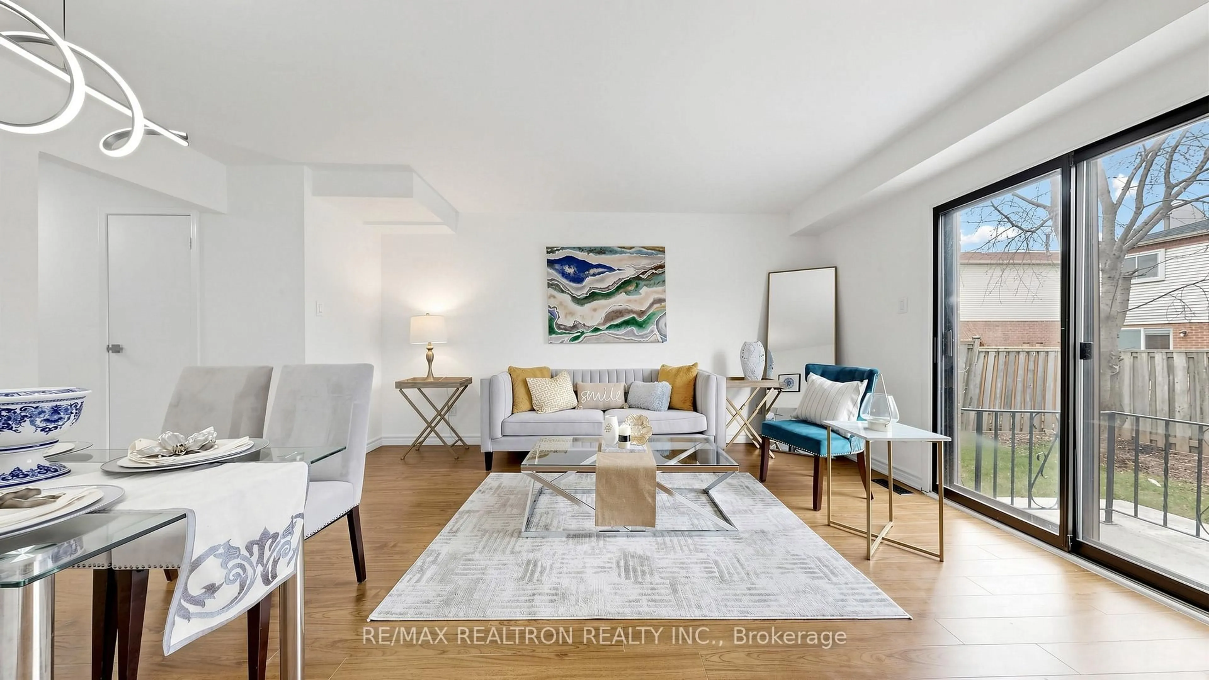 Living room with furniture, wood/laminate floor for 58 Glanvil Cres, Toronto Ontario M1B 4R7