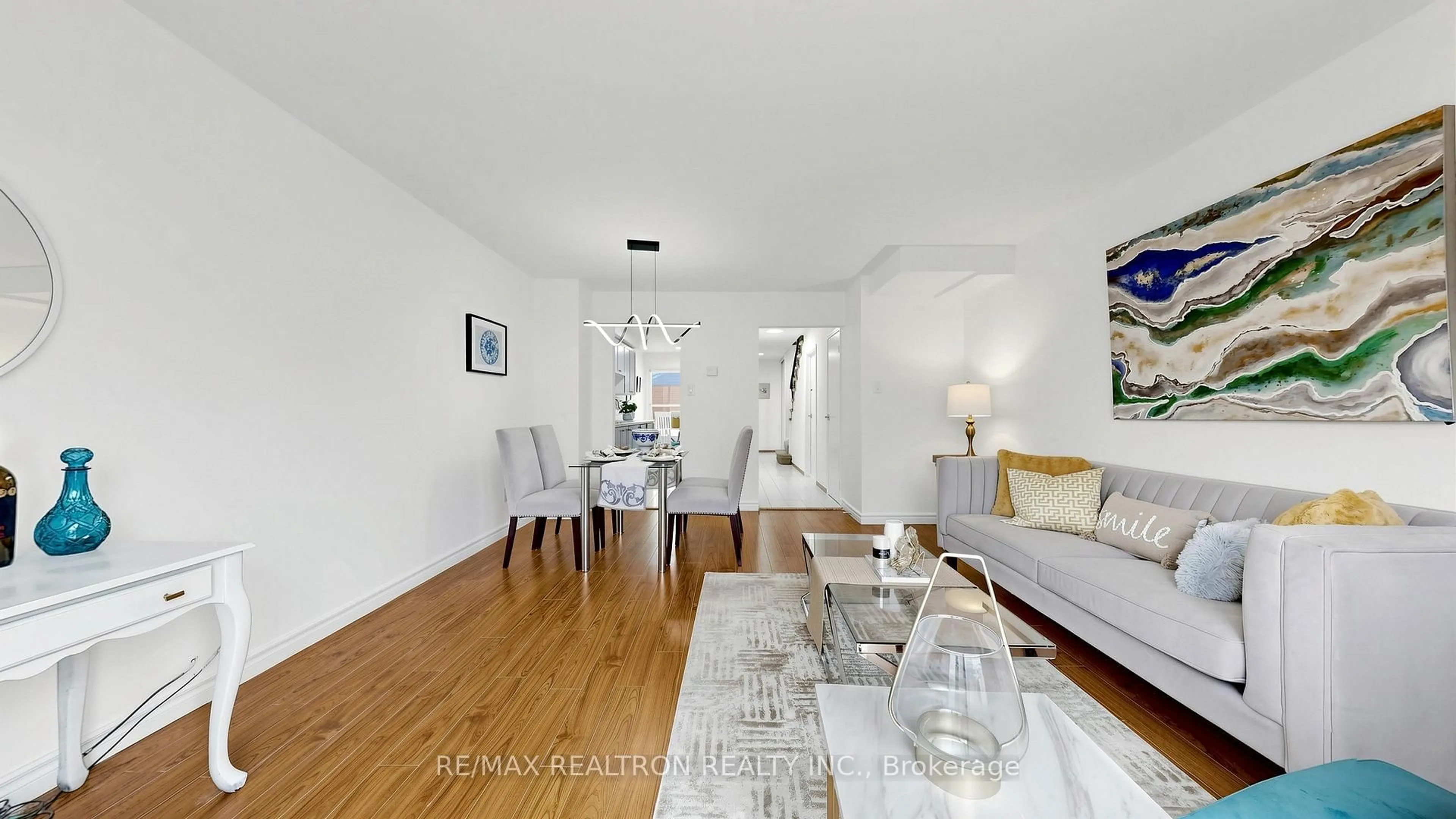 Dining room, wood/laminate floor for 58 Glanvil Cres, Toronto Ontario M1B 4R7