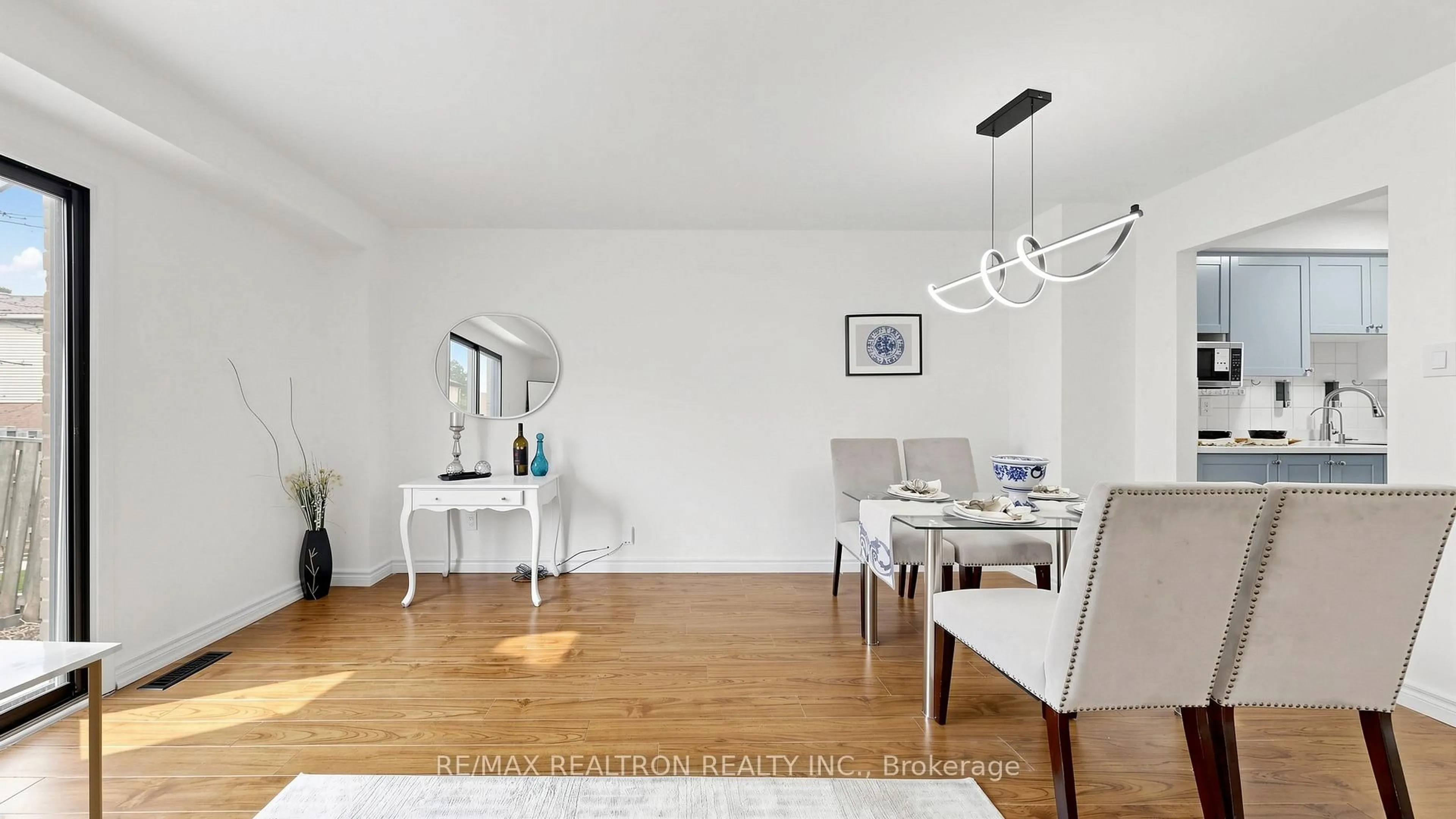 Dining room, wood/laminate floor for 58 Glanvil Cres, Toronto Ontario M1B 4R7