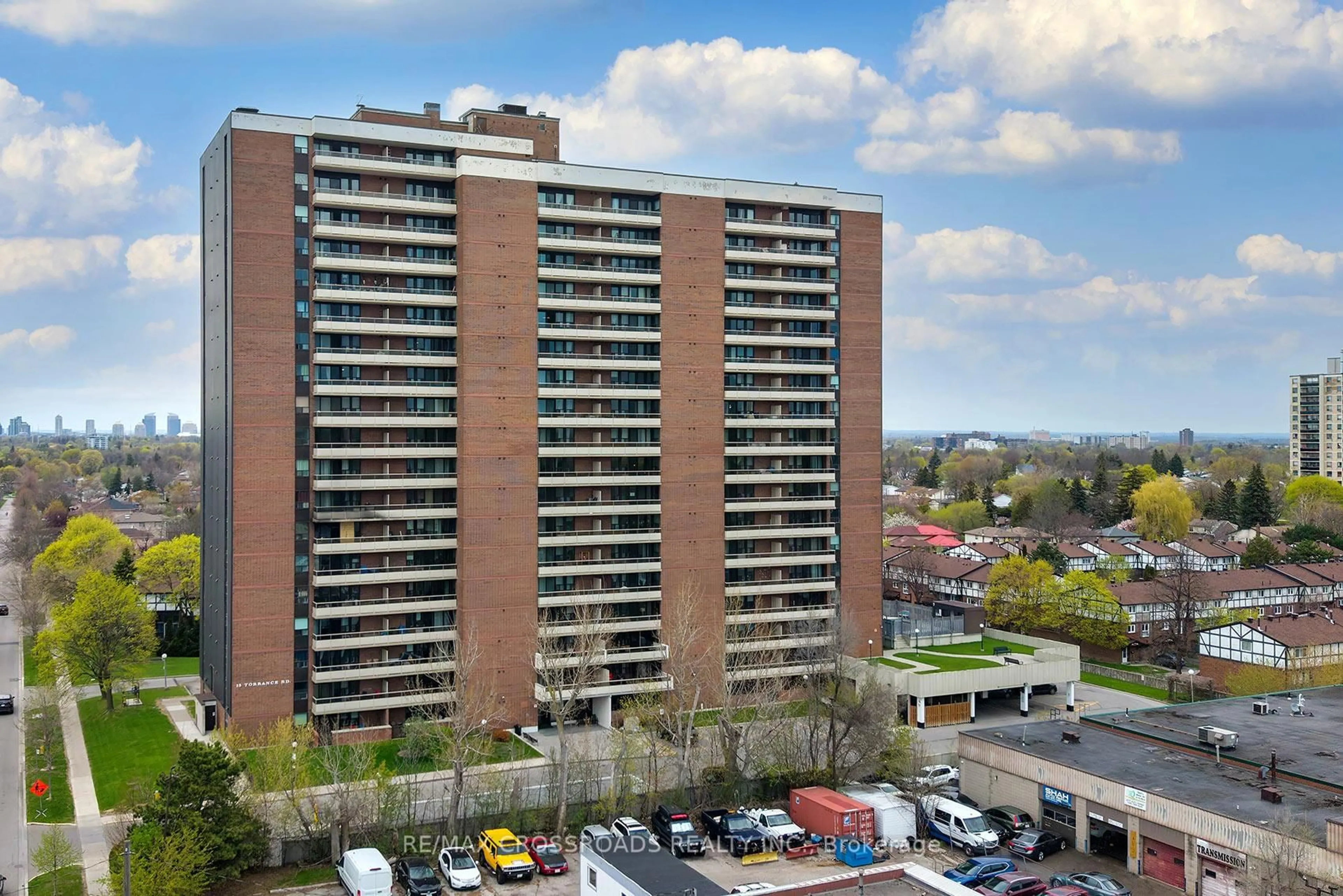 A pic from outside/outdoor area/front of a property/back of a property/a pic from drone, city buildings view from balcony for 15 Torrance Rd #211, Toronto Ontario M1J 3K2