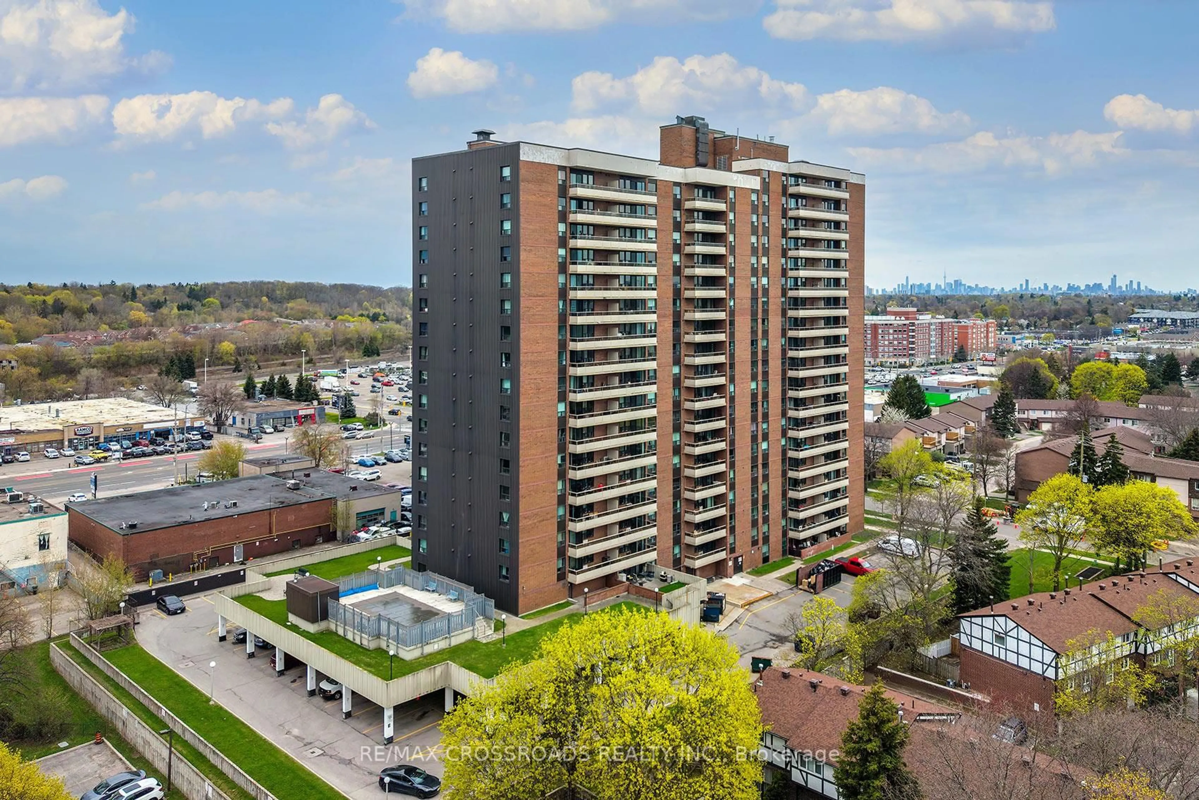 A pic from outside/outdoor area/front of a property/back of a property/a pic from drone, city buildings view from balcony for 15 Torrance Rd #211, Toronto Ontario M1J 3K2