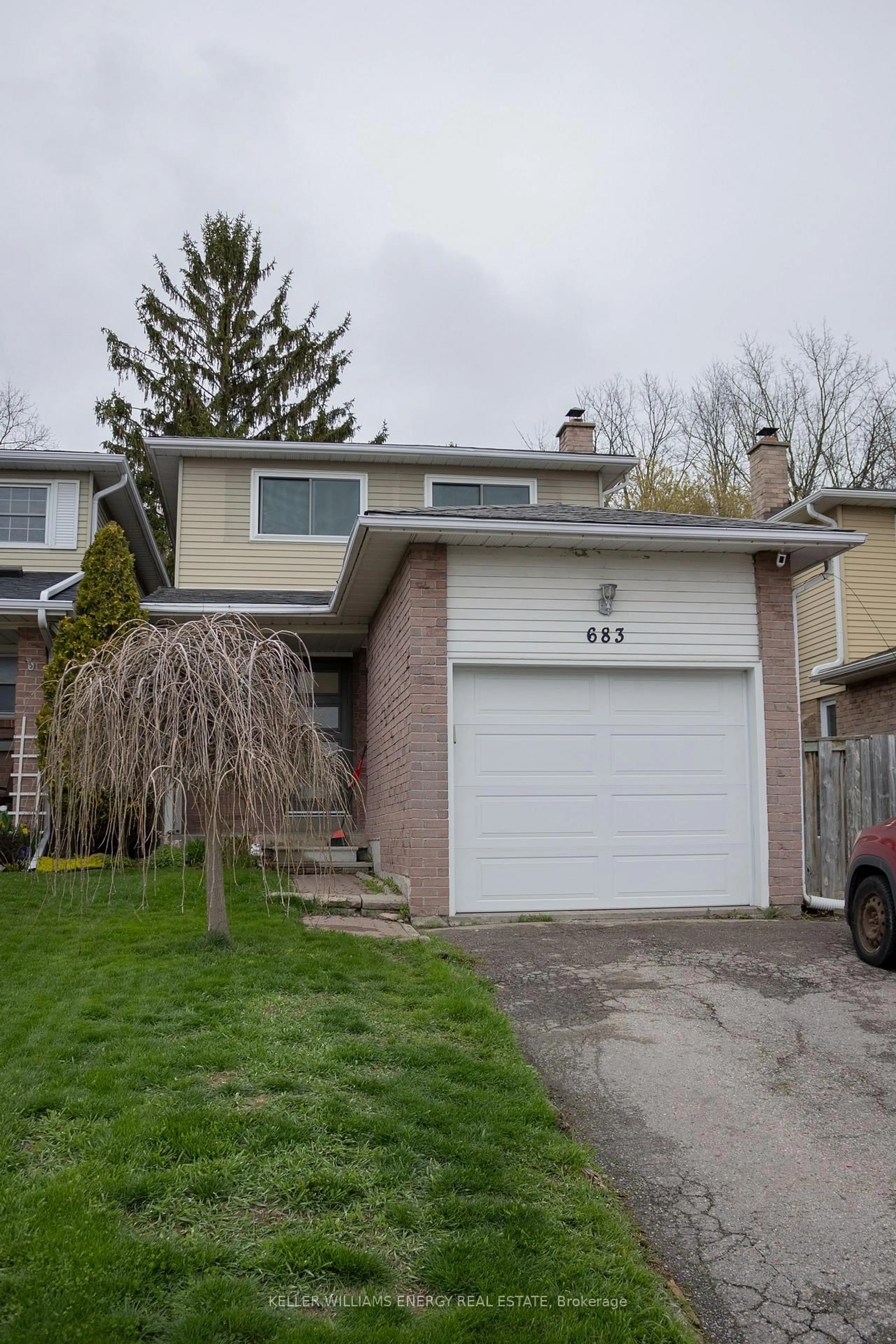 Home with vinyl exterior material, street for 683 Grandview Dr, Oshawa Ontario L1H 7V9