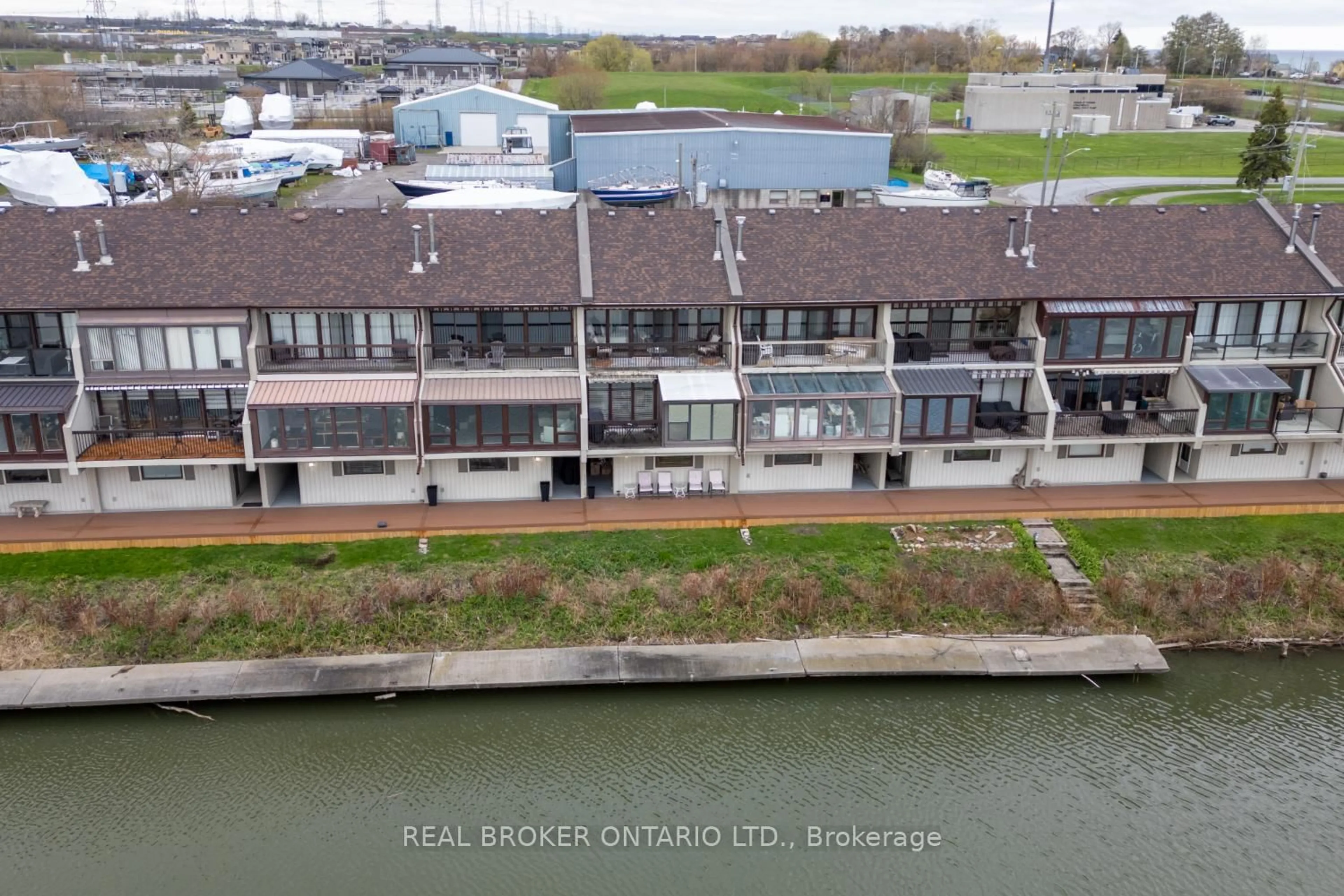 A pic from outside/outdoor area/front of a property/back of a property/a pic from drone, water/lake/river/ocean view for 120 Port Darlington Rd #16, Clarington Ontario L1C 6V1
