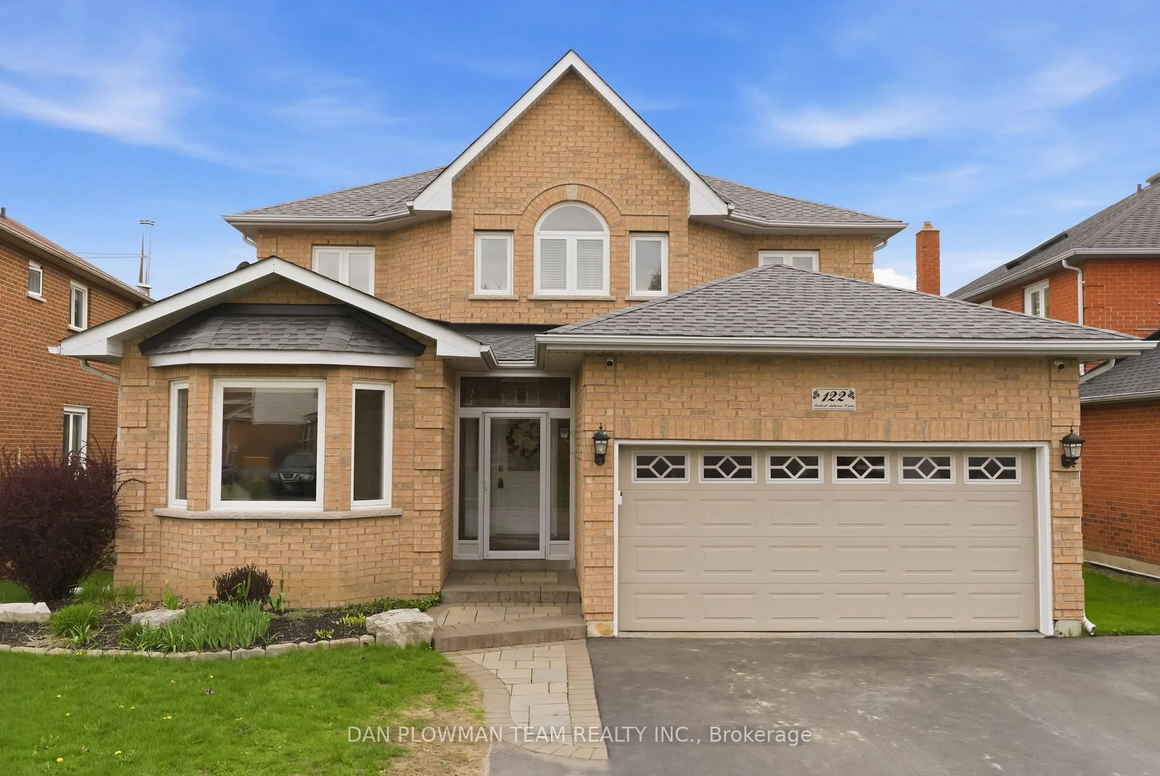 Home with brick exterior material, street for 122 Robert Adams Dr, Clarington Ontario L1E 2C4