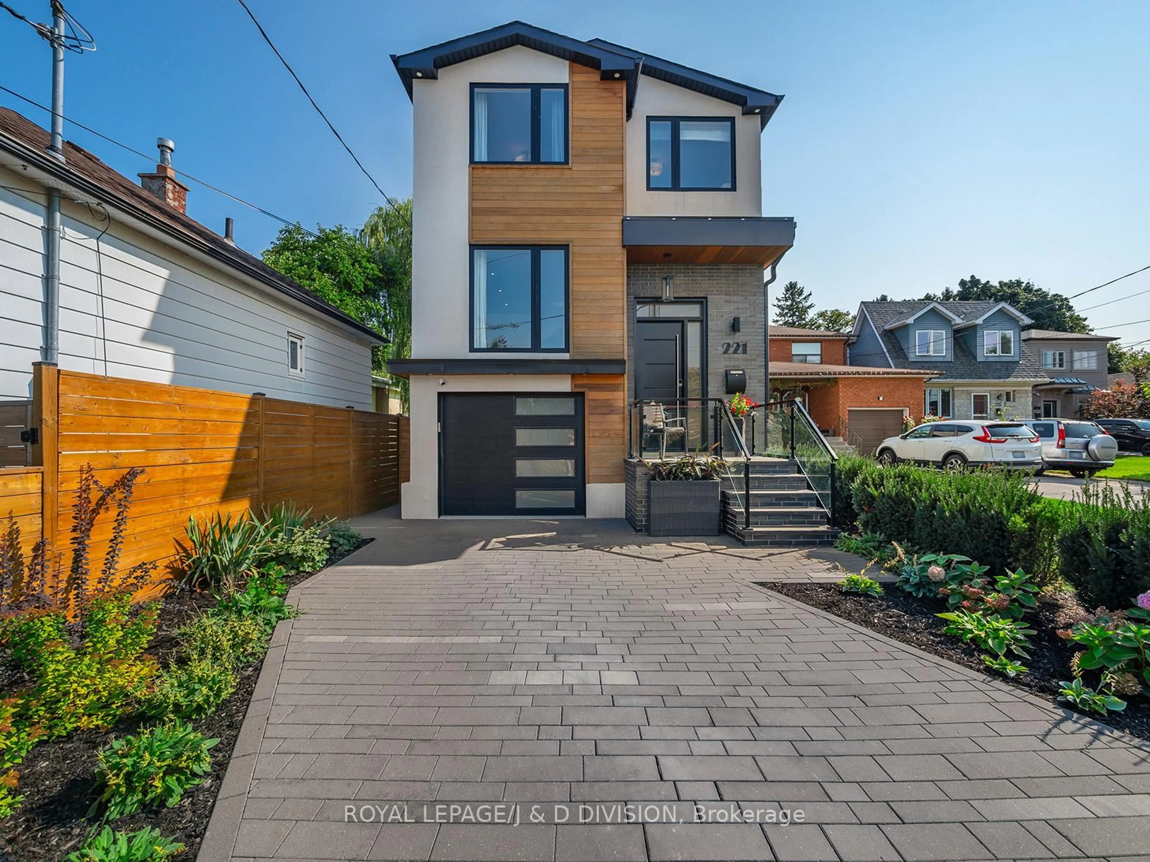Home with brick exterior material, street for 221 Virginia Ave, Toronto Ontario M4C 2T6
