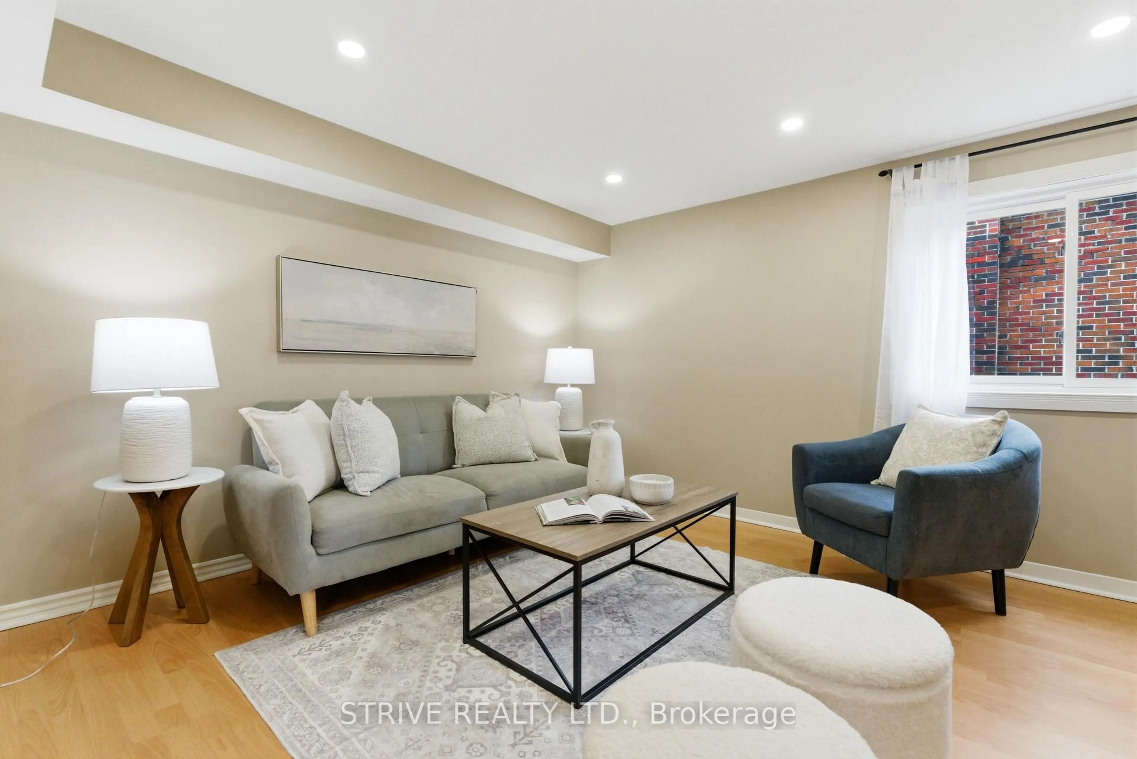 Living room with furniture, wood/laminate floor for 284 College Ave, Oshawa Ontario L1J 1R8