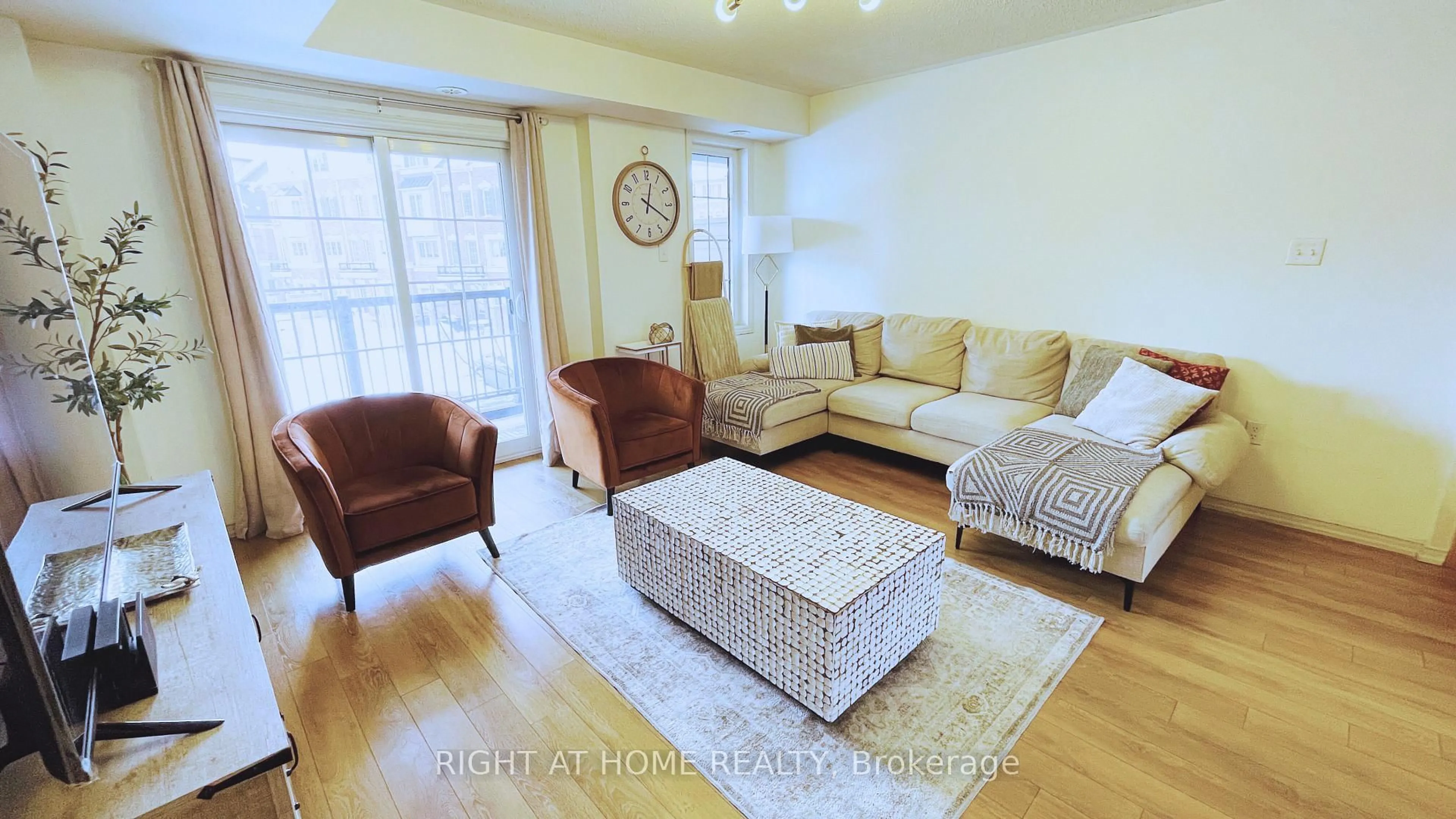 Living room with furniture, wood/laminate floor for 2372 Chevron Prince Path, Oshawa Ontario L1L 0K9