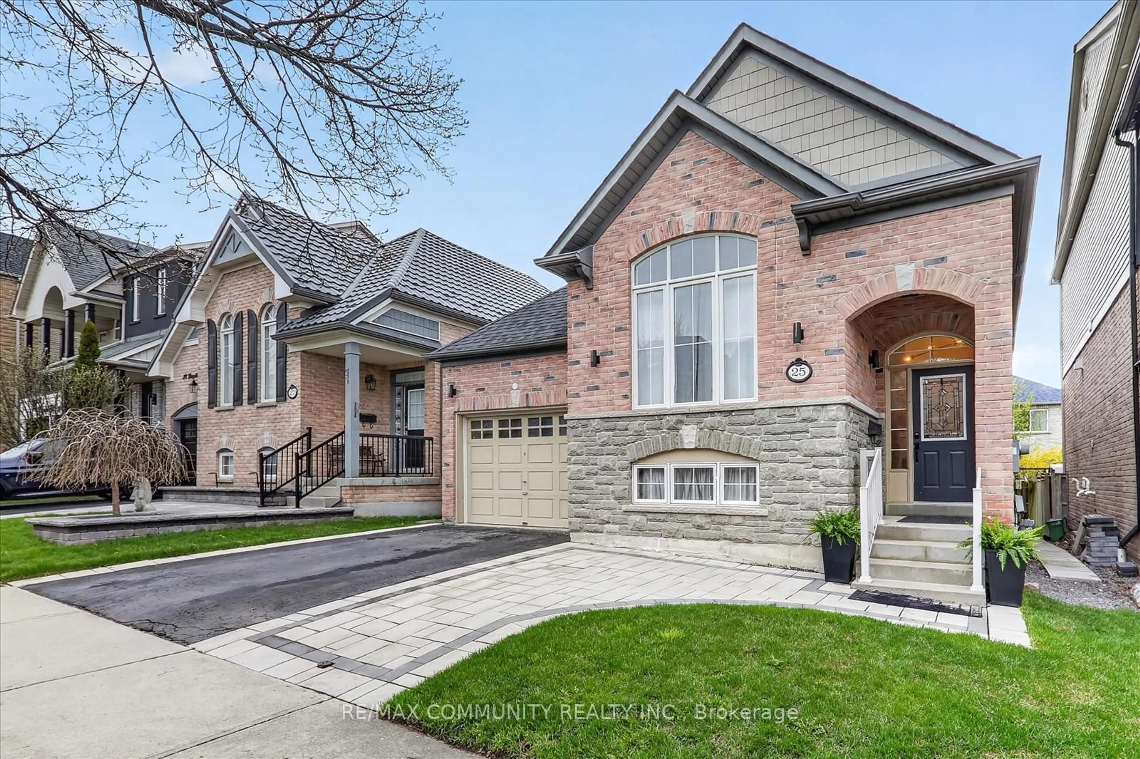 Home with brick exterior material, street for 25 Loughlin Hill Cres, Ajax Ontario L1Z 1P8