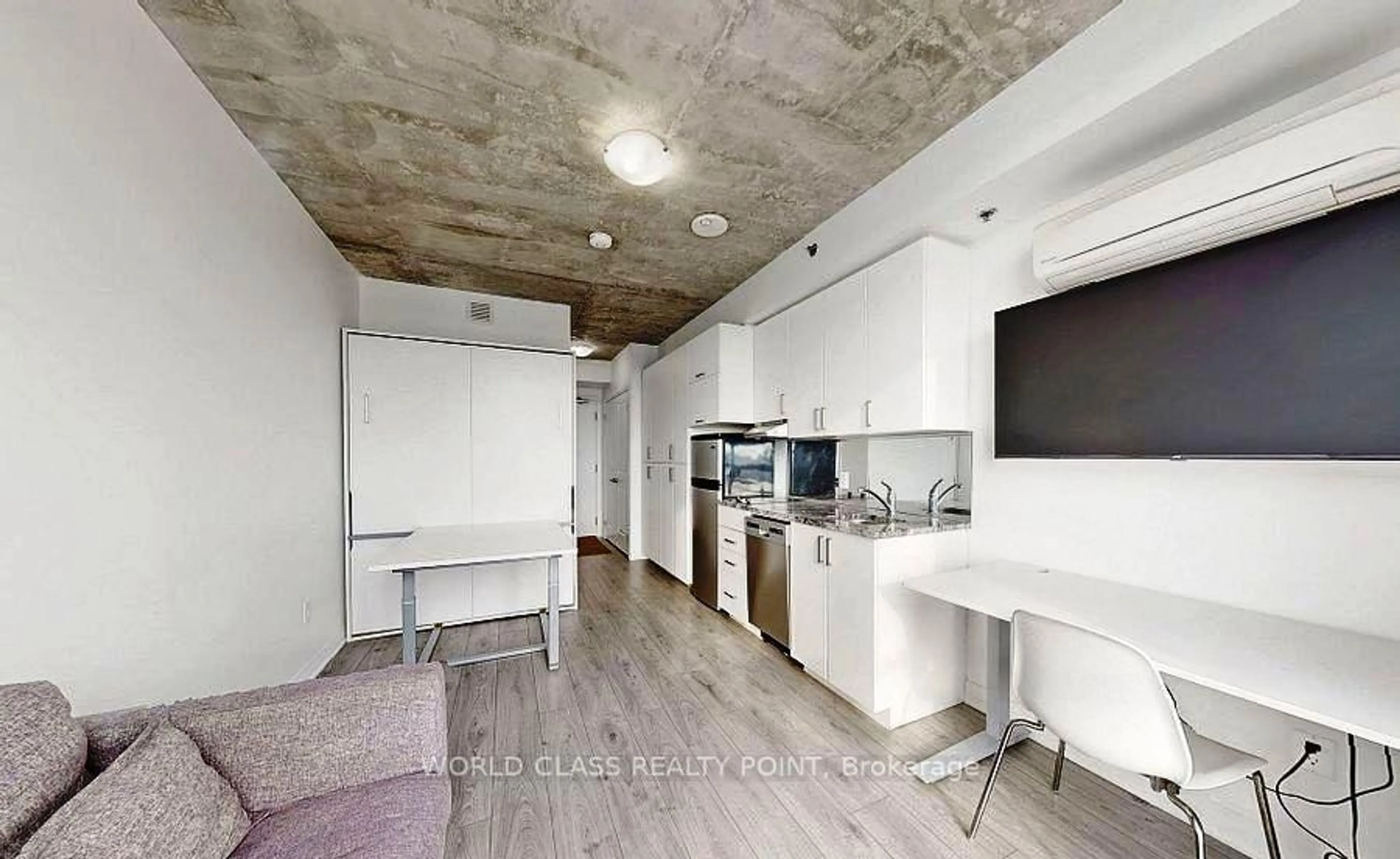 Open concept kitchen, cement floor for 1900 Simcoe St, Oshawa Ontario L1G 4Y3