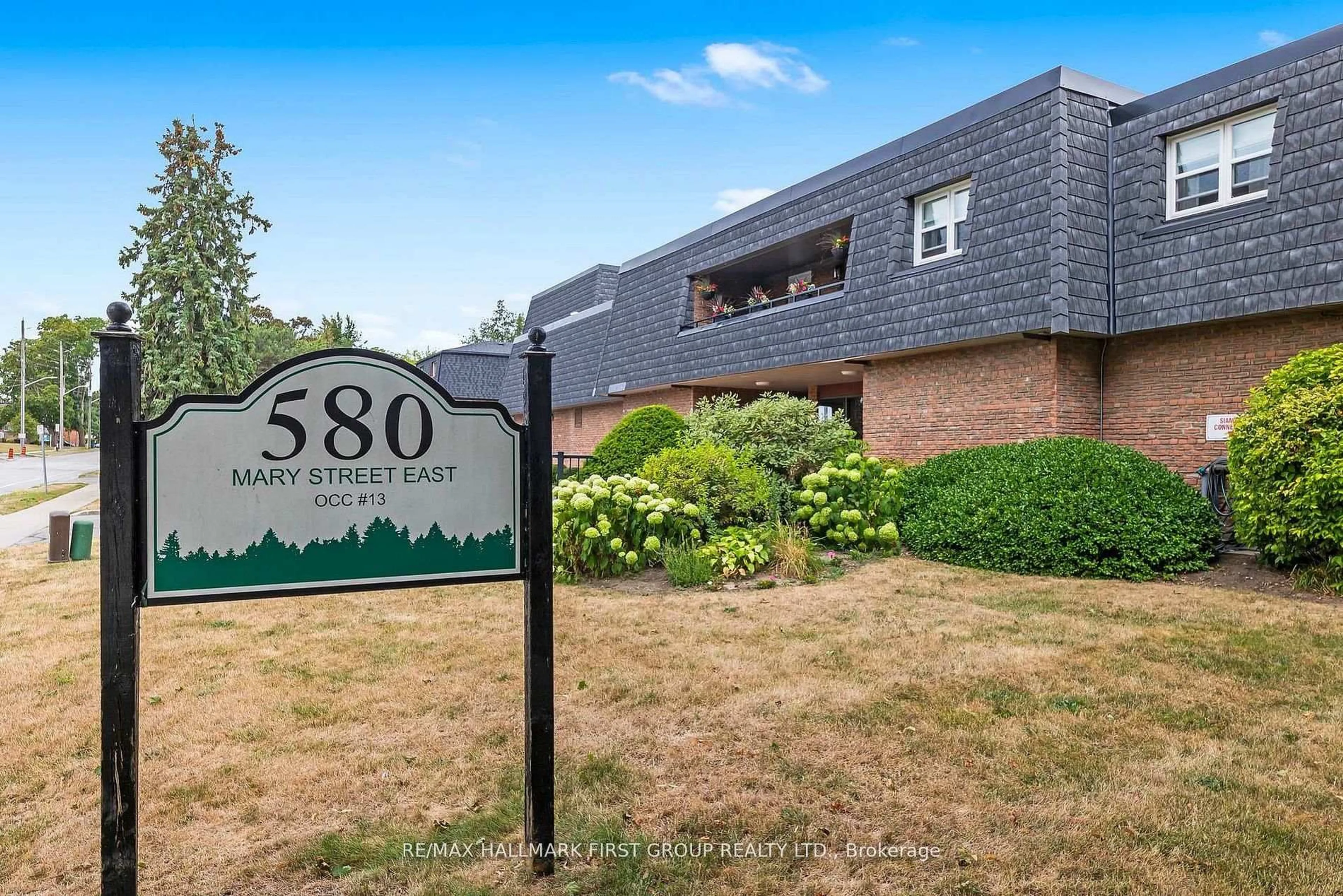 Home with brick exterior material, street for 580 Mary St #102, Whitby Ontario L1N 2R3