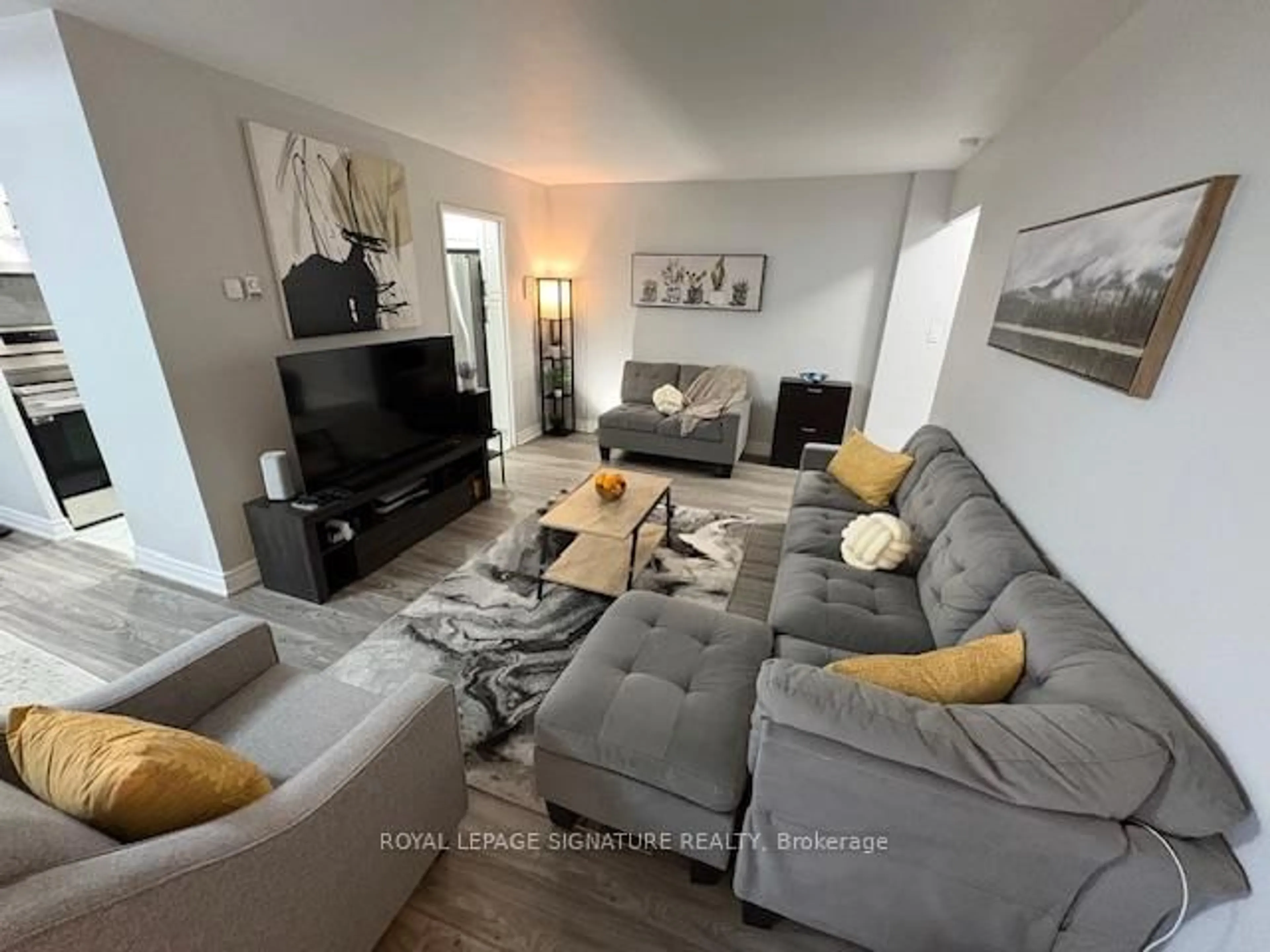 Living room with furniture, unknown for 5 Massey Sq #1701, Toronto Ontario M4C 5L6