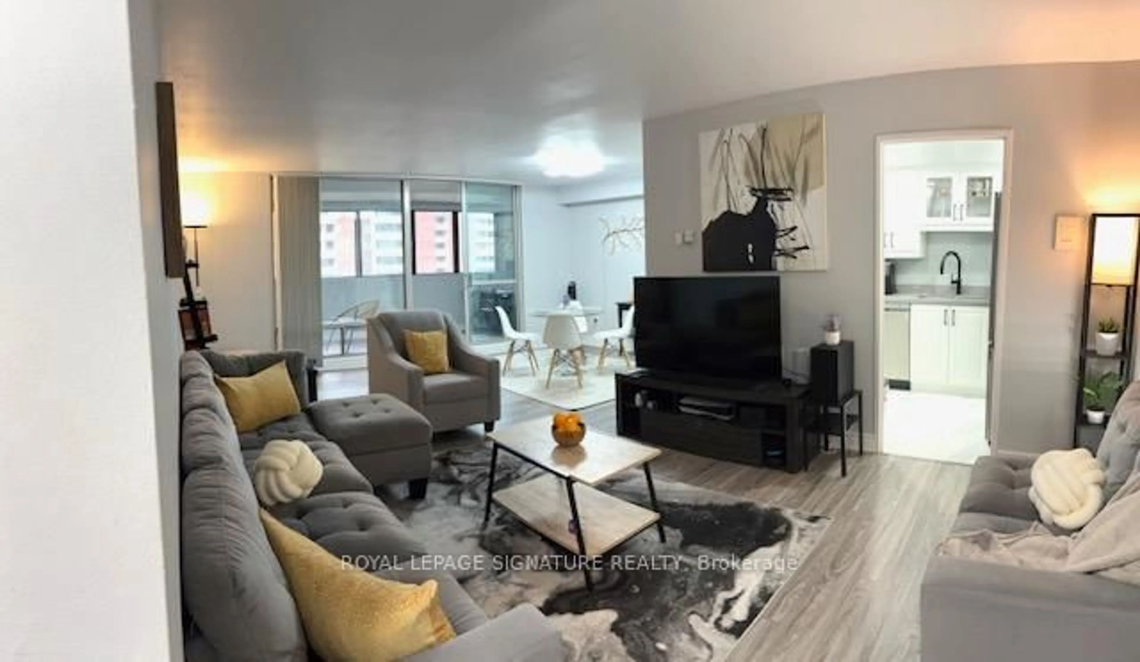 Living room with furniture, unknown for 5 Massey Sq #1701, Toronto Ontario M4C 5L6