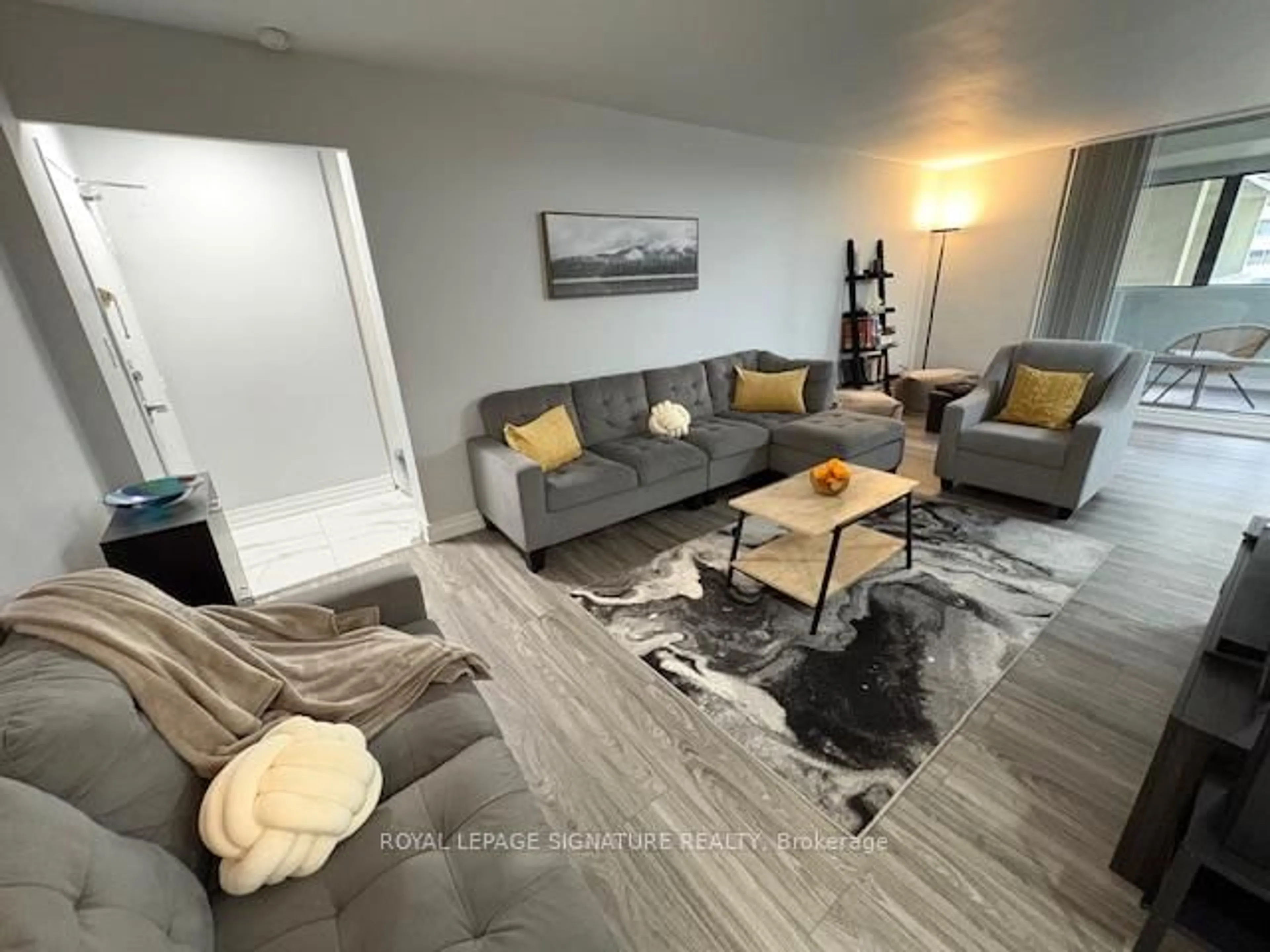 Living room with furniture, unknown for 5 Massey Sq #1701, Toronto Ontario M4C 5L6