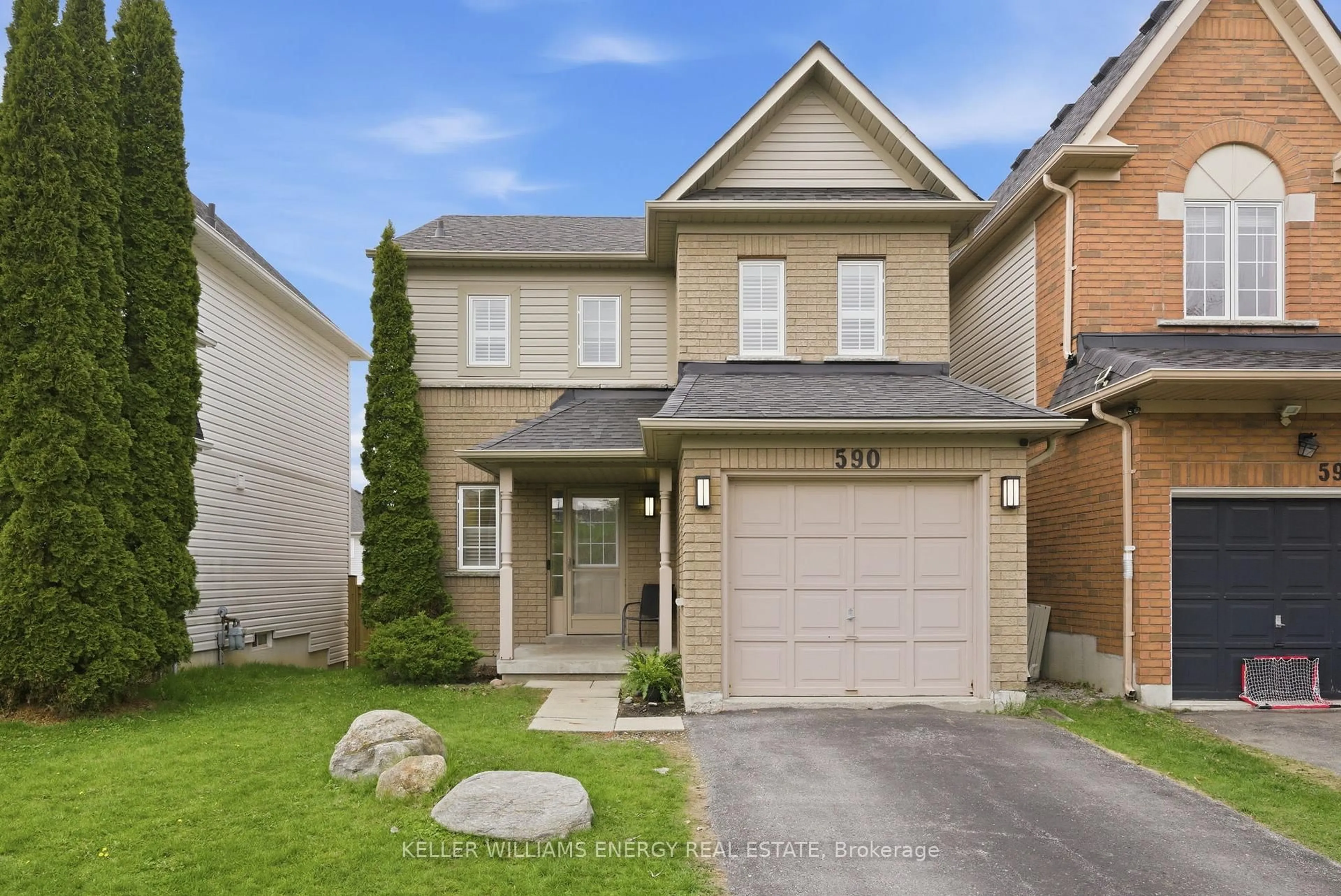 Home with brick exterior material, street for 590 Brasswinds Tr, Oshawa Ontario L1K 2Z2