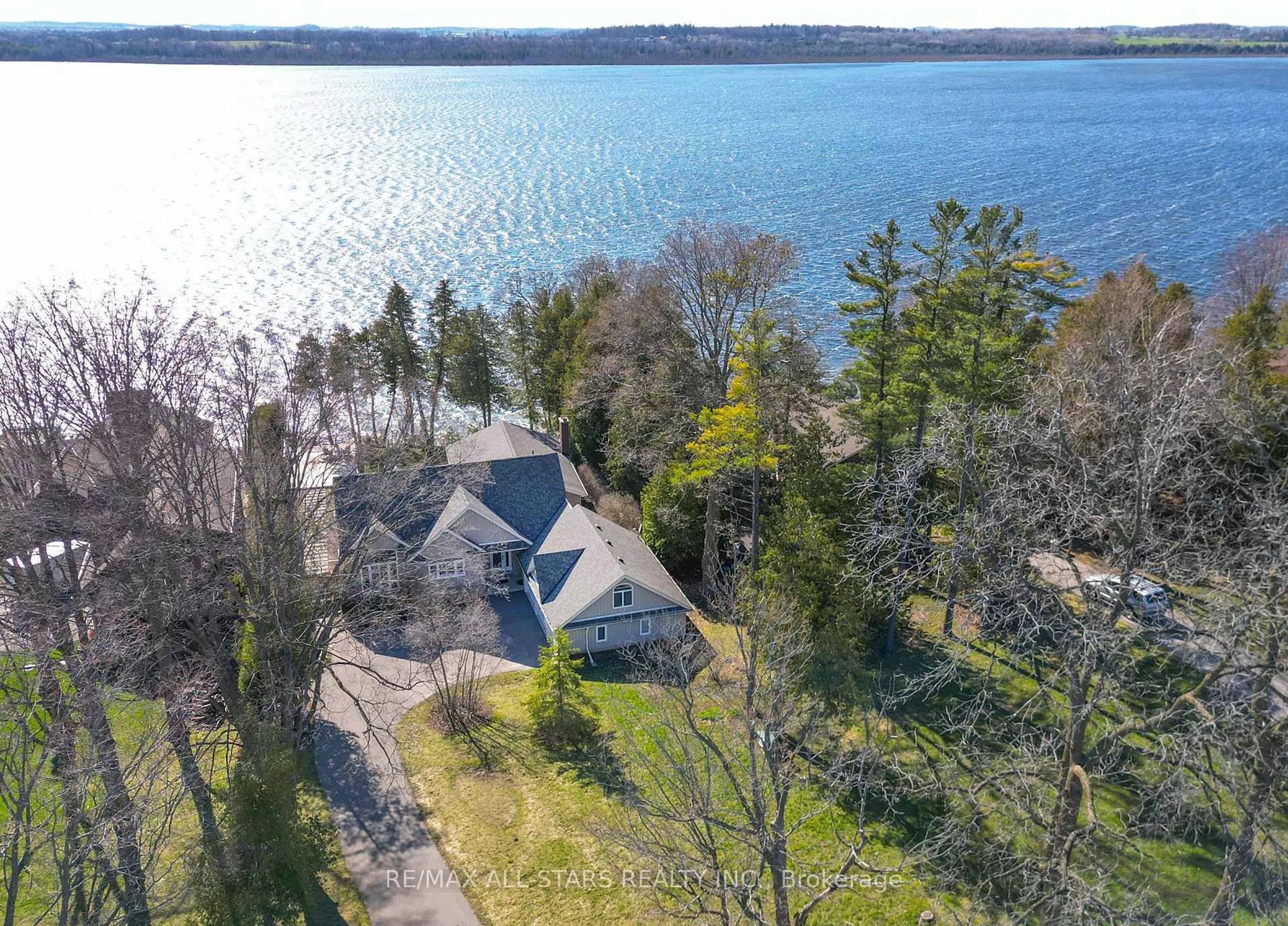 A pic from outside/outdoor area/front of a property/back of a property/a pic from drone, water/lake/river/ocean view for 253 Stephenson Point Rd, Scugog Ontario L9L 1B4