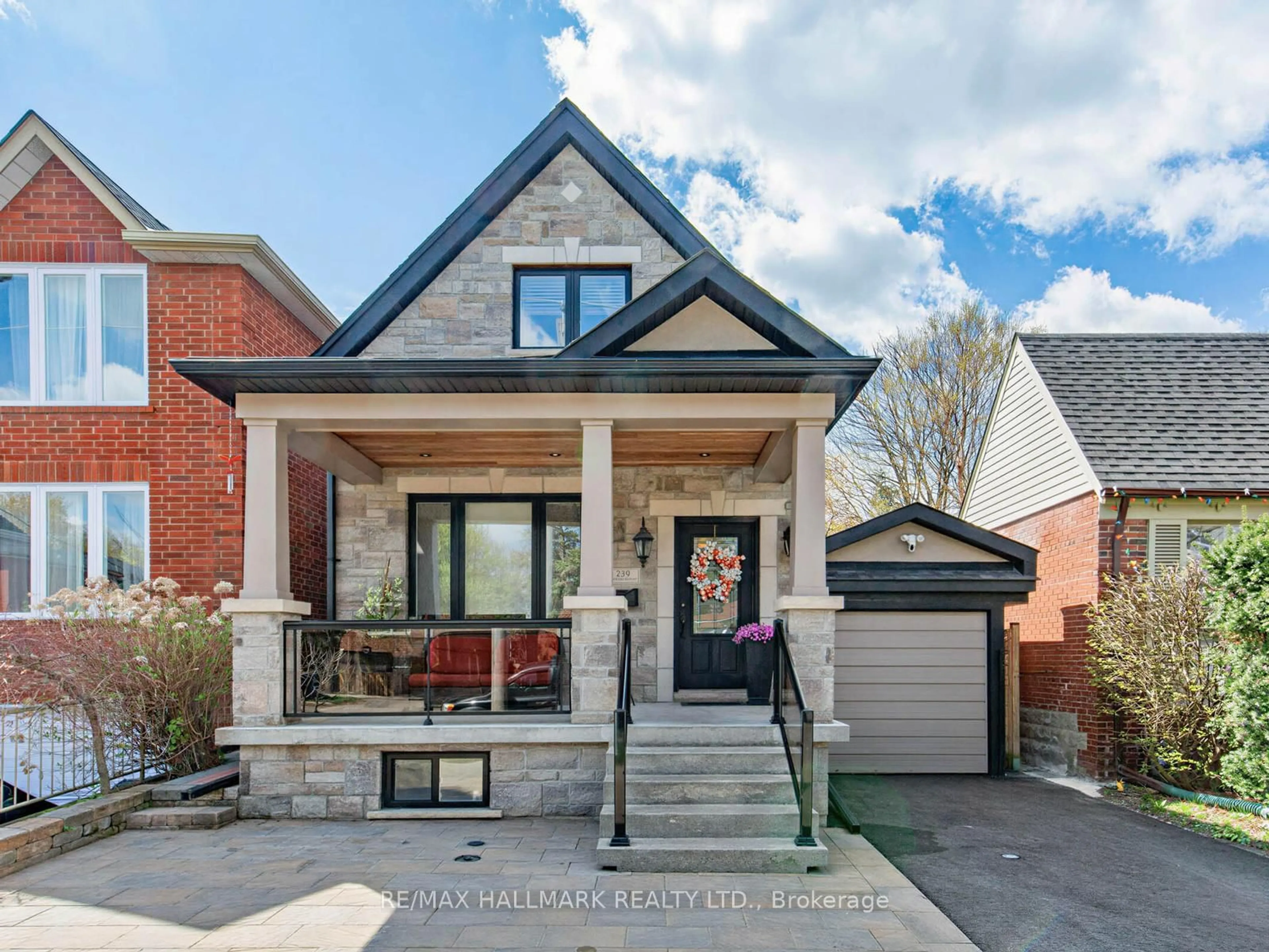 Home with brick exterior material, street for 239 Torrens Ave, Toronto Ontario M4J 2P6