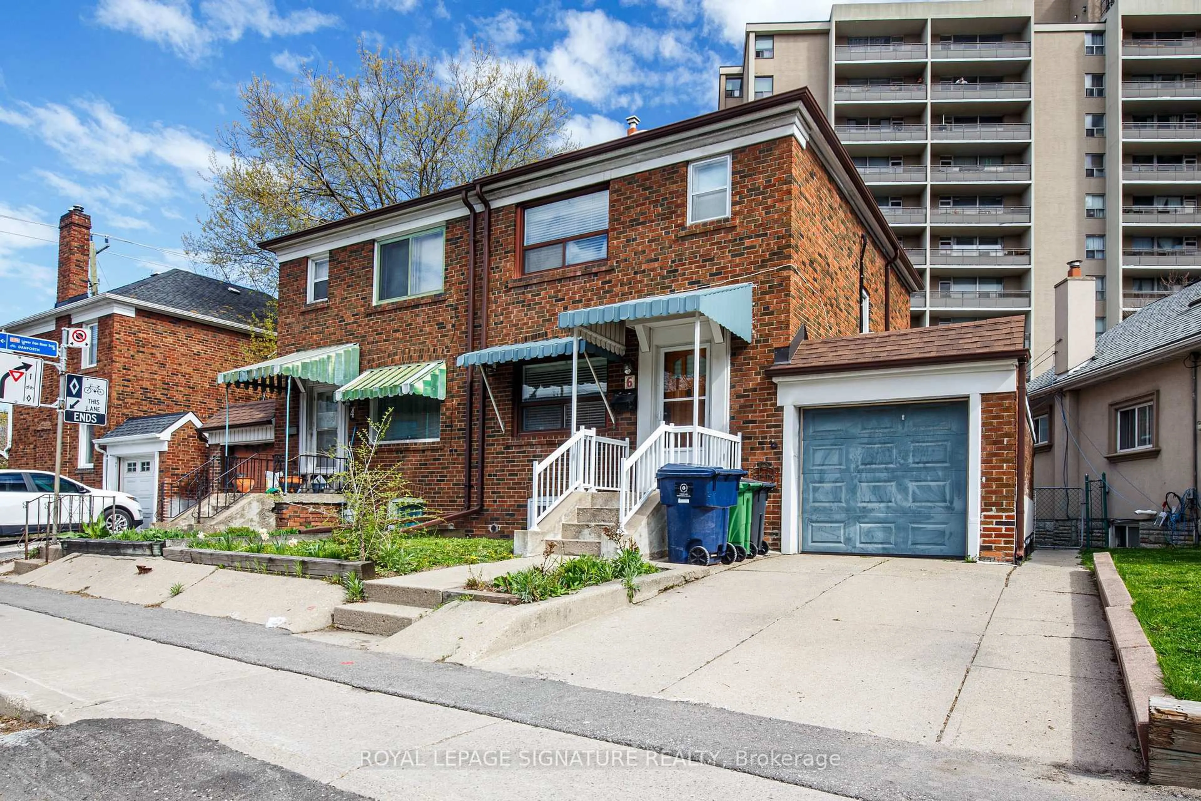 Home with brick exterior material, street for 6 Cosburn Ave, Toronto Ontario M6E 2S7