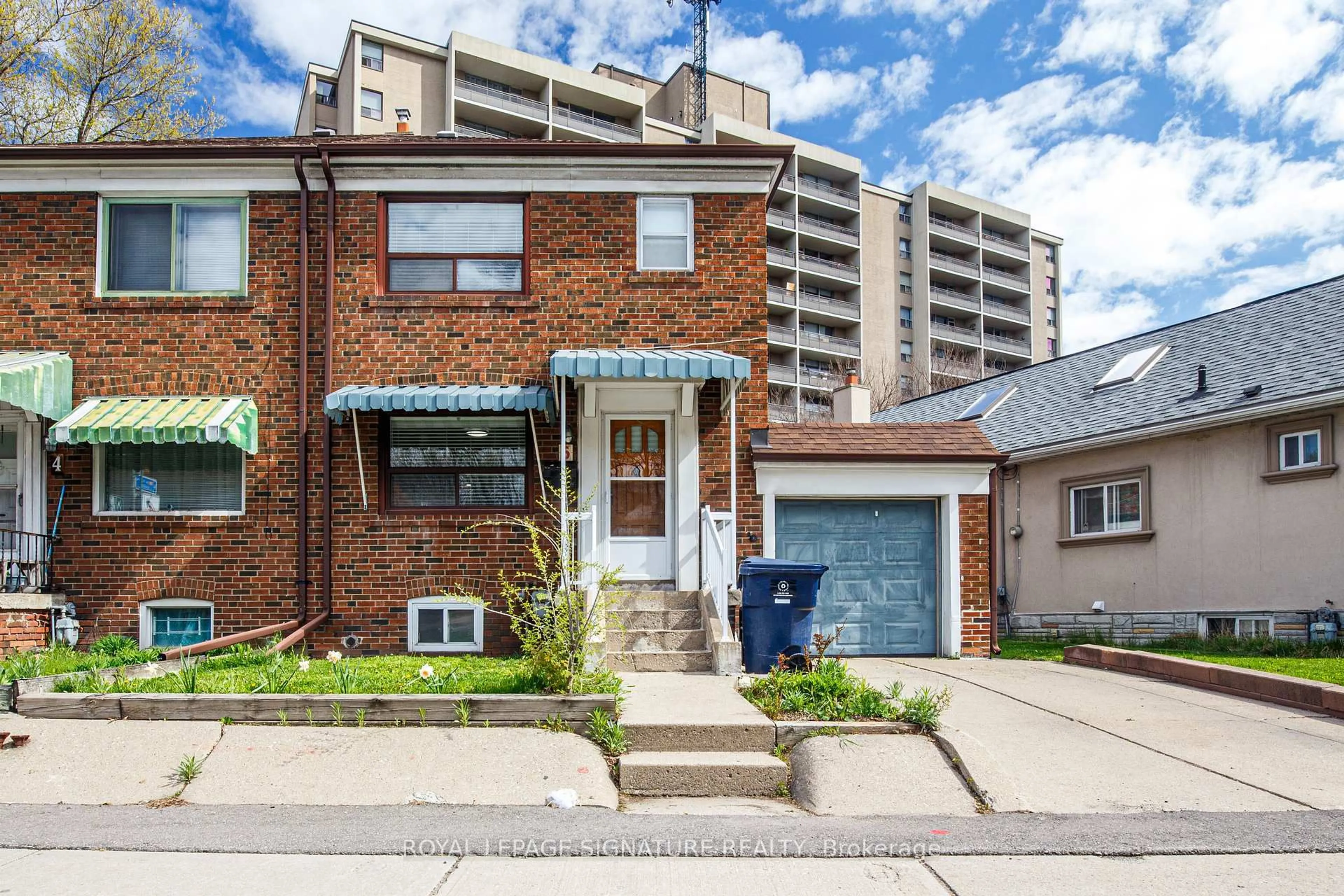Home with brick exterior material, street for 6 Cosburn Ave, Toronto Ontario M6E 2S7