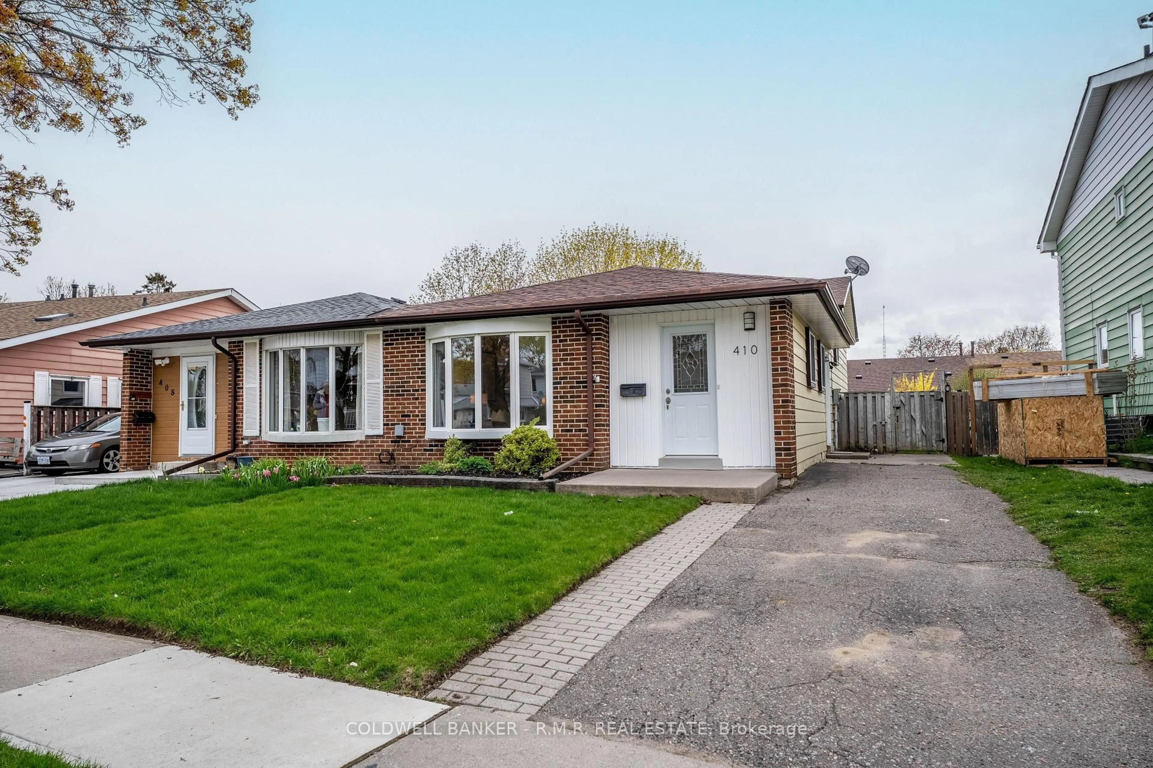 Home with brick exterior material, street for 410 Century St, Oshawa Ontario L1K 1C6
