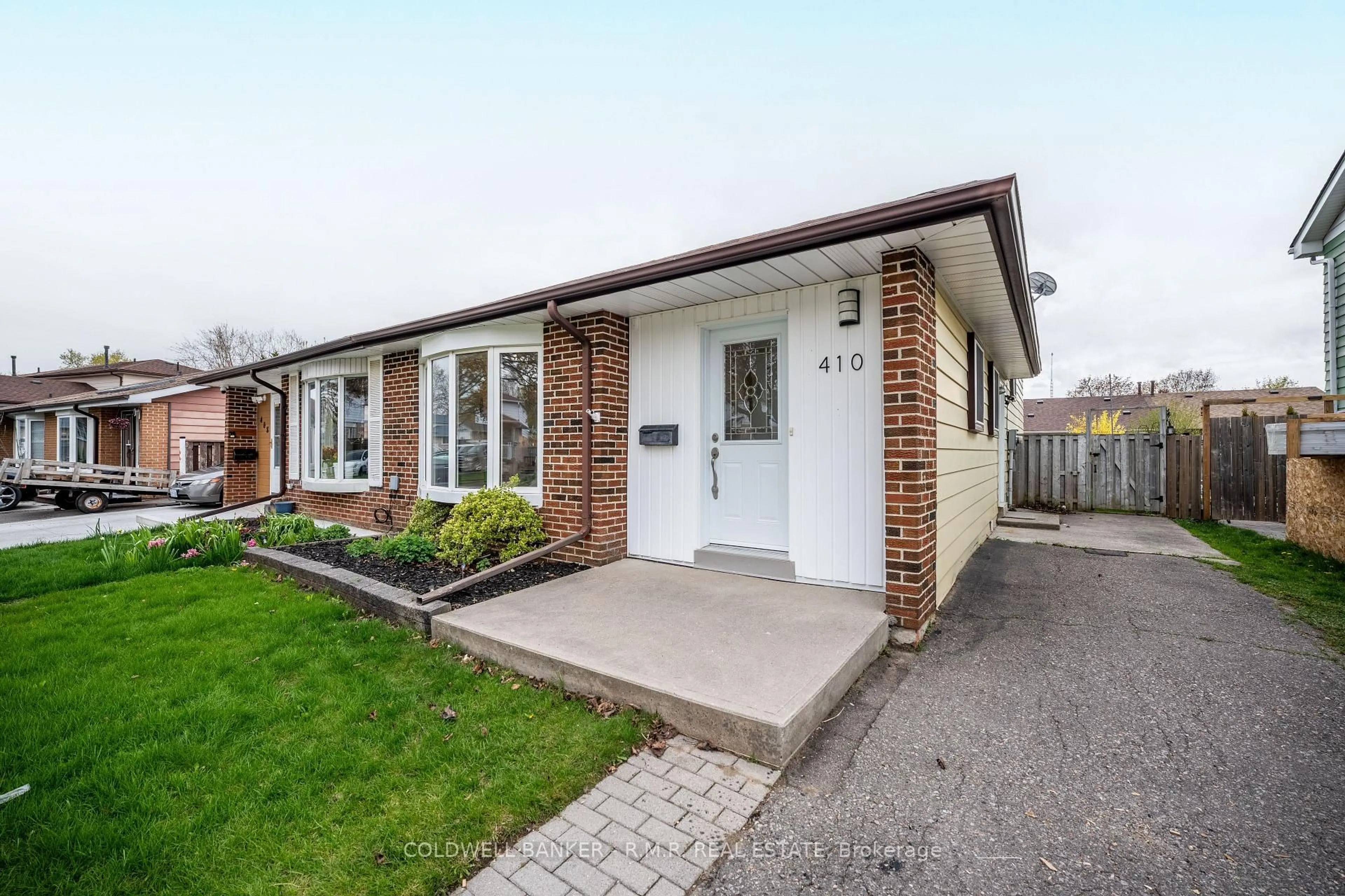 Home with brick exterior material, street for 410 Century St, Oshawa Ontario L1K 1C6